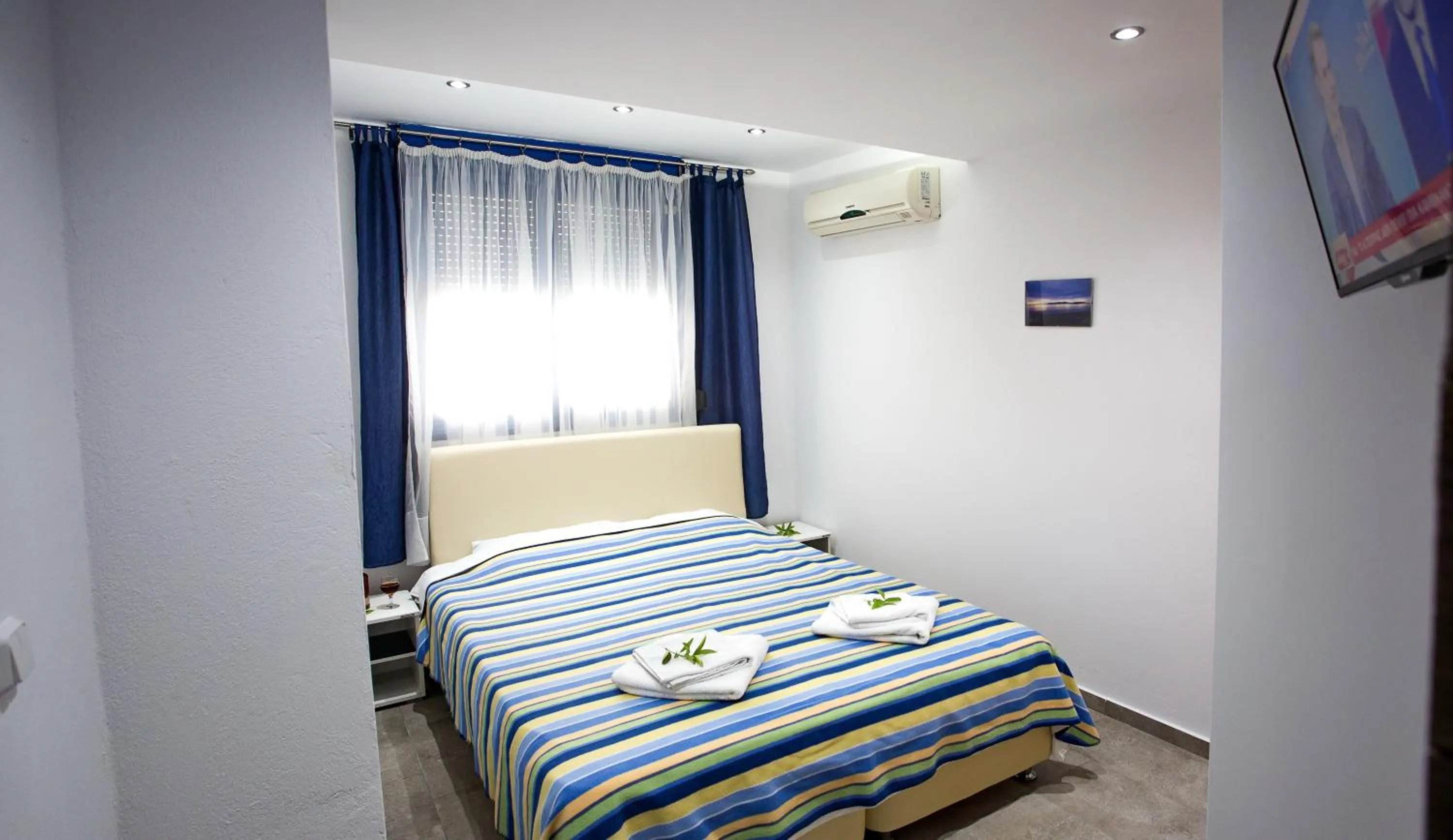 Bed in The Blue Beach Apartments