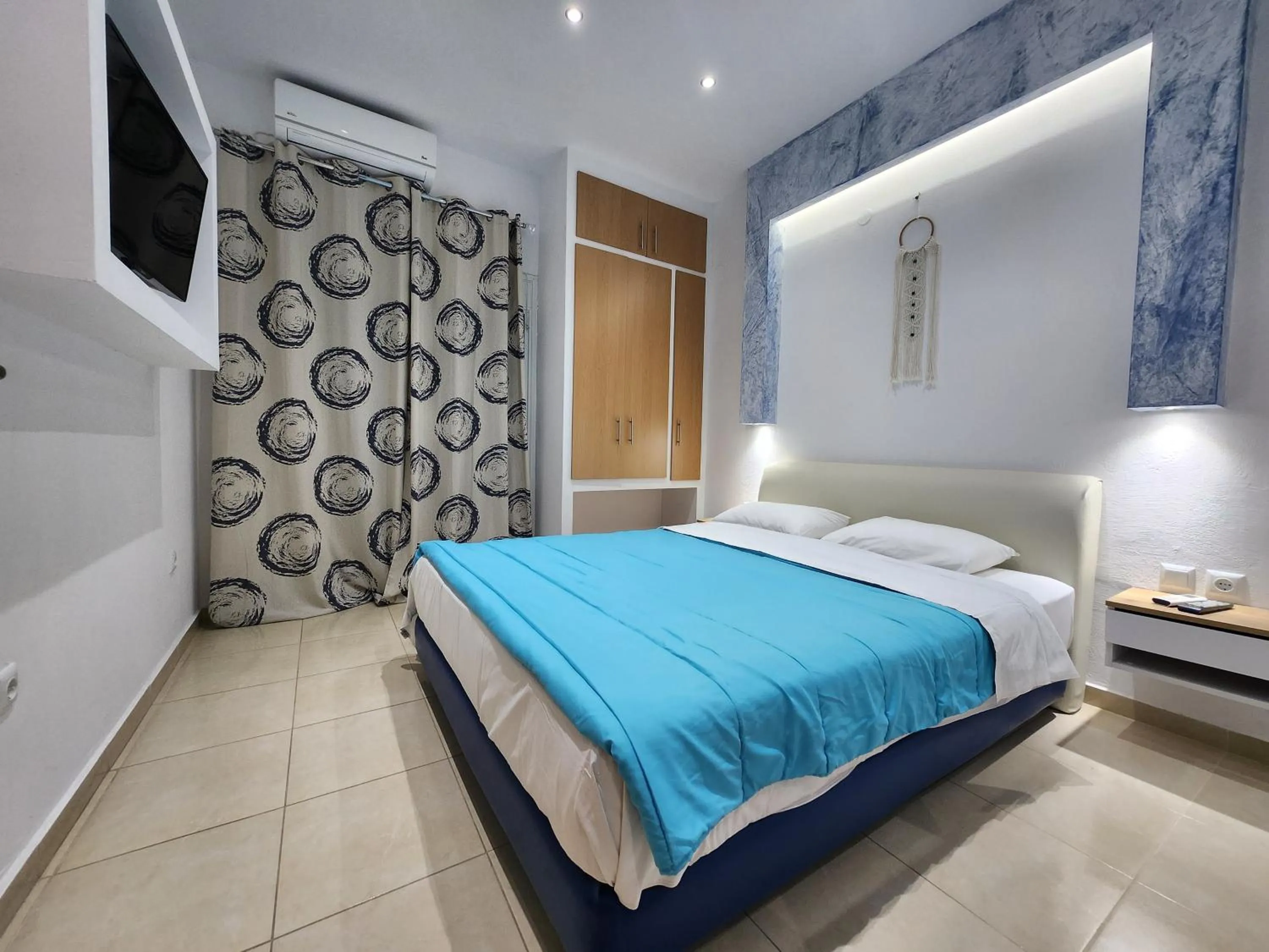Bed in The Blue Beach Apartments