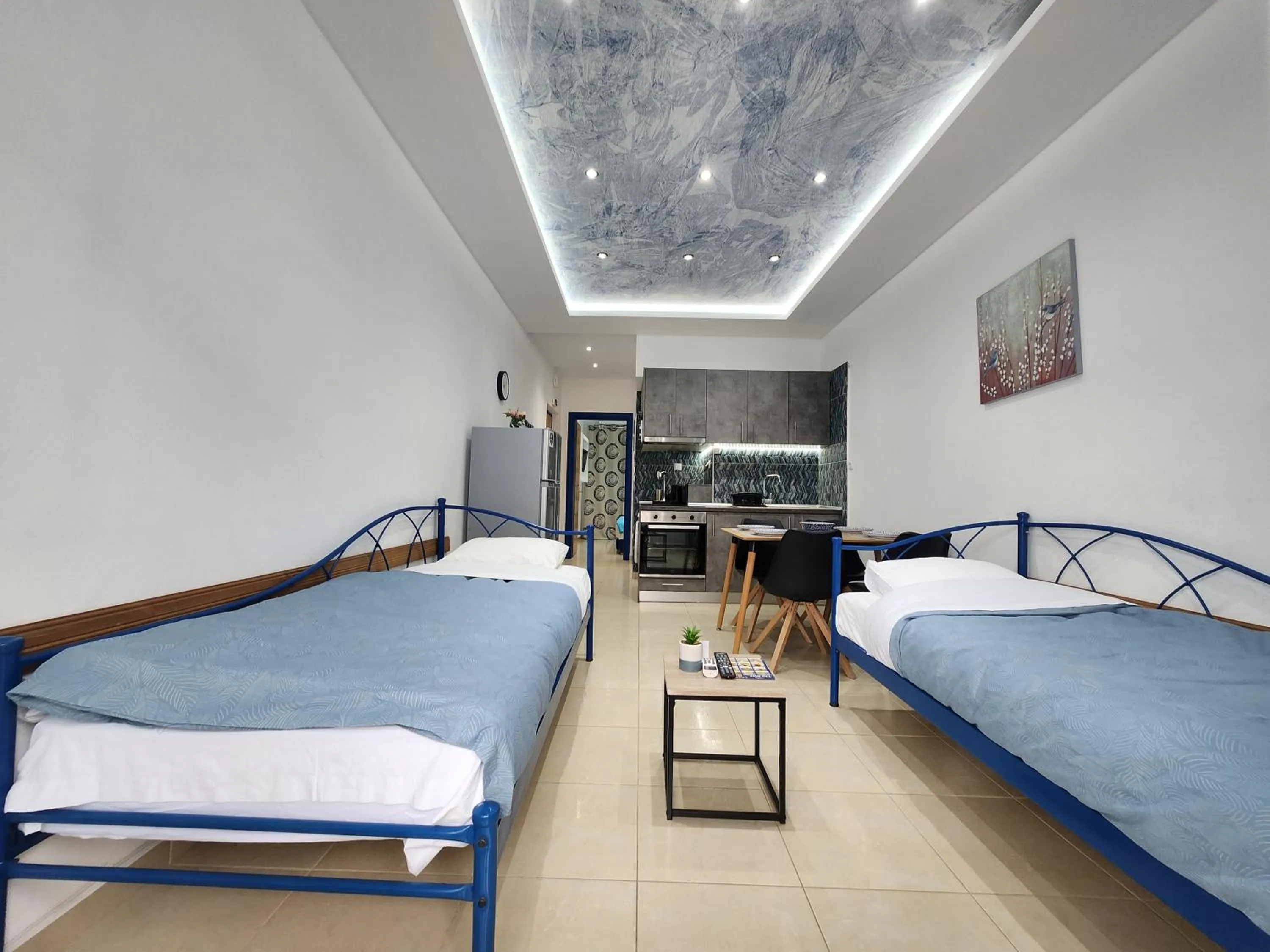 Bed in The Blue Beach Apartments