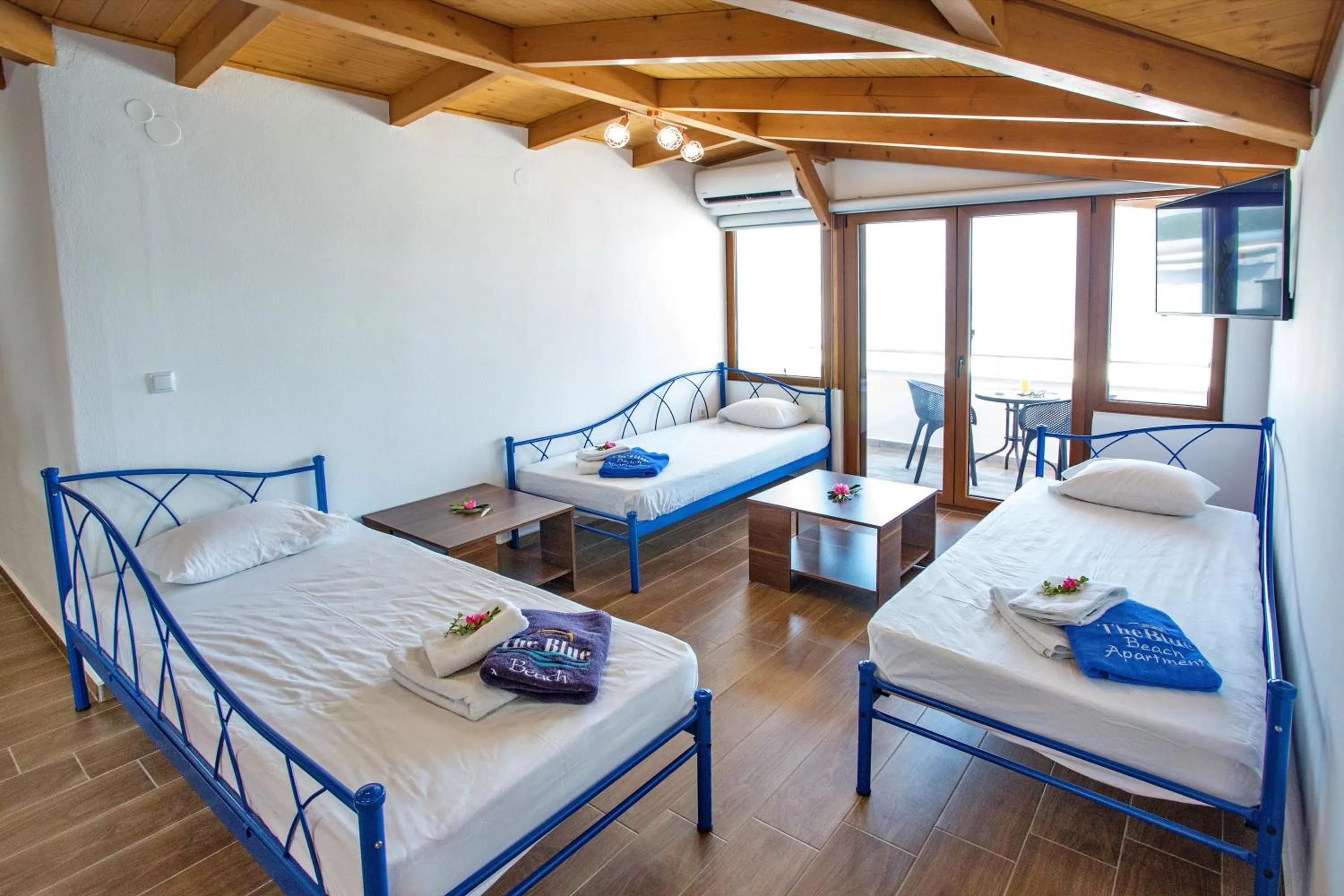 Bed in The Blue Beach Apartments