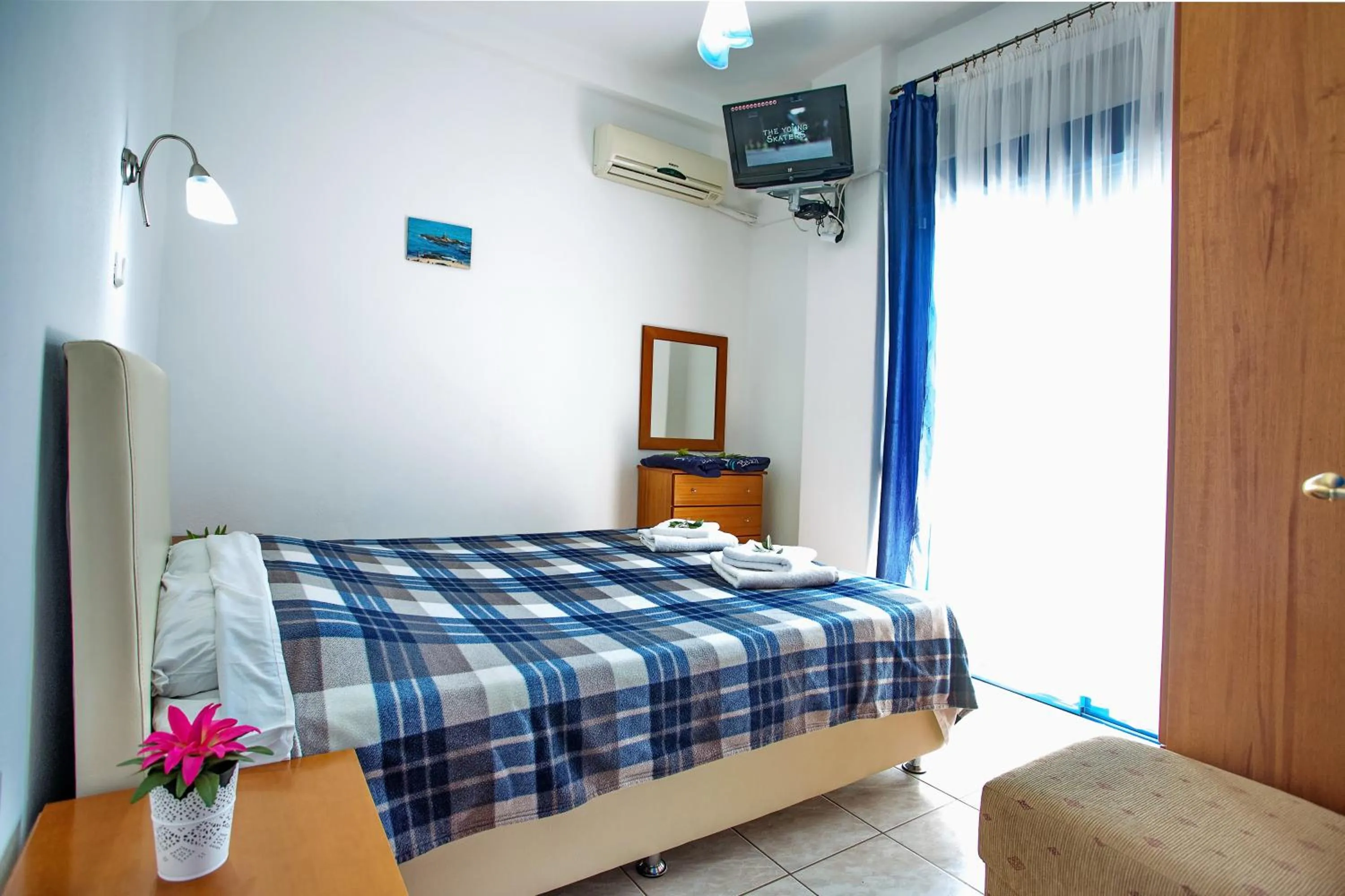 Bed in The Blue Beach Apartments