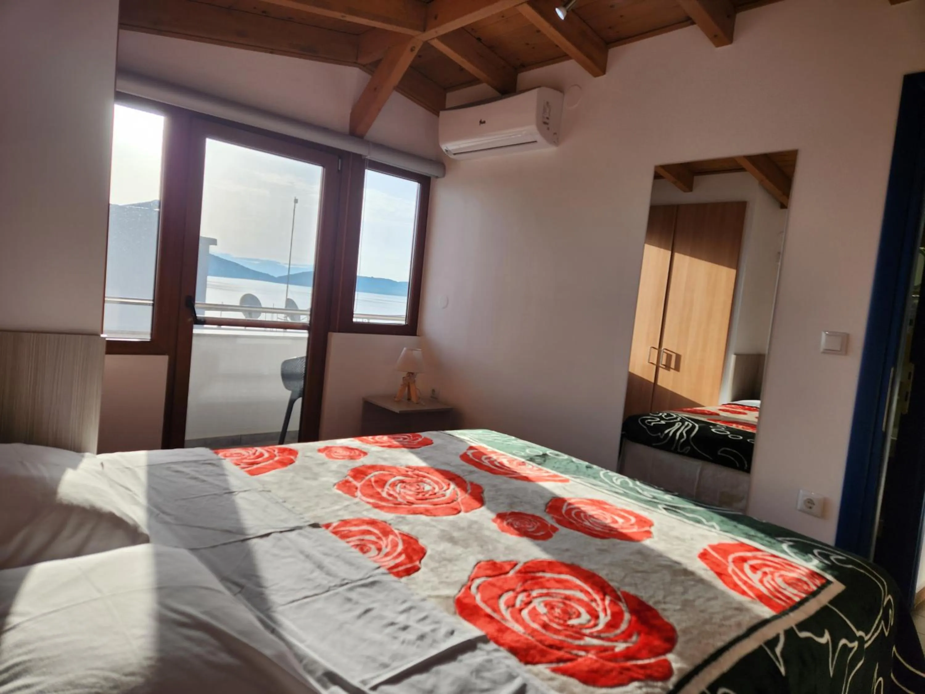 Bed in The Blue Beach Apartments