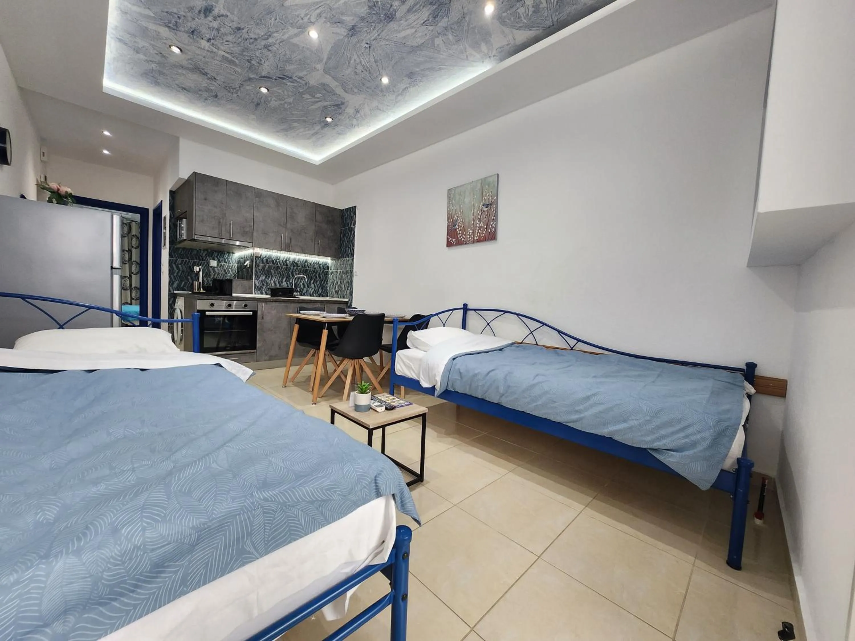 Bed in The Blue Beach Apartments