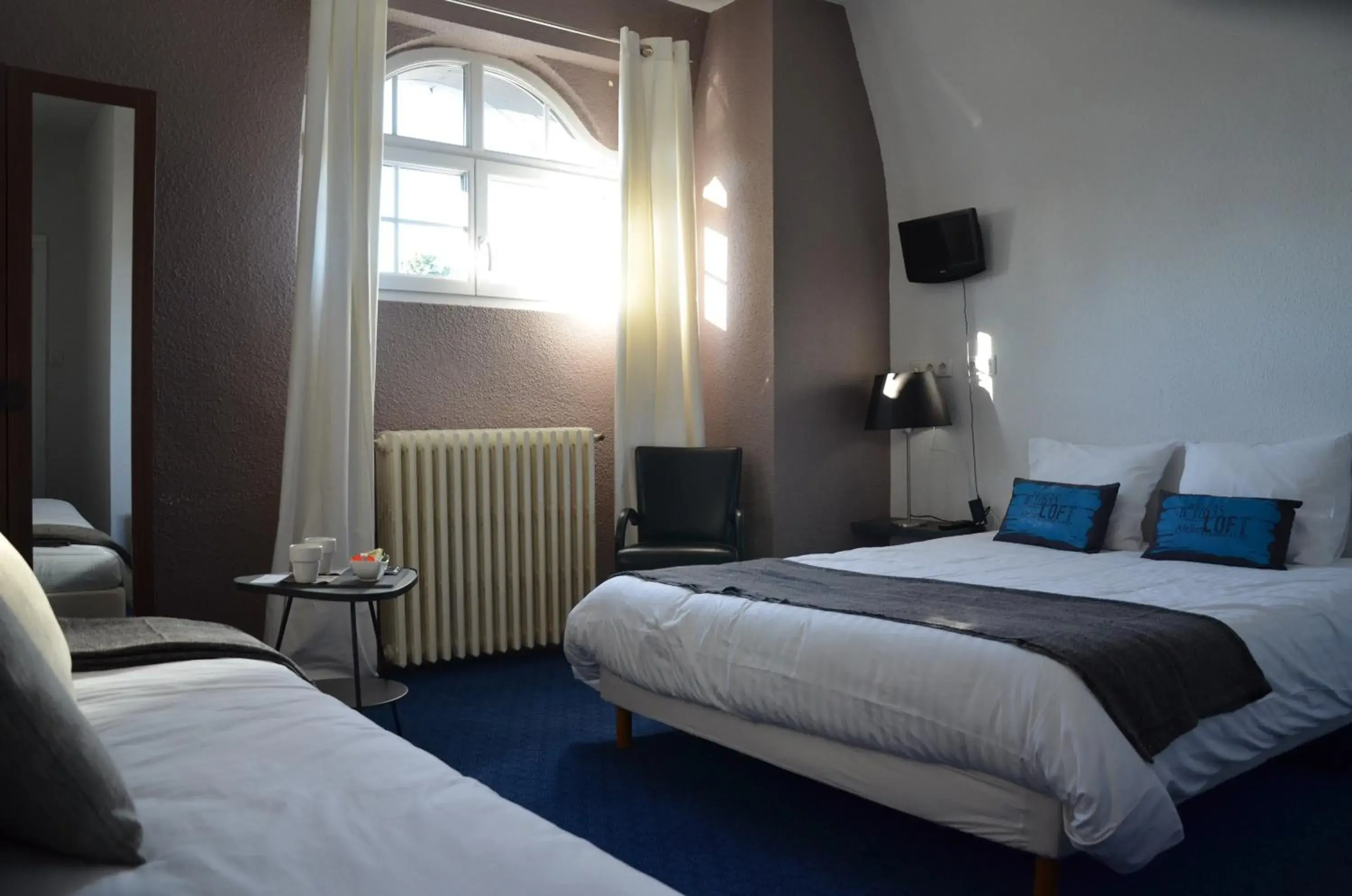 Triple Room in Hôtel la Régie Triple Room in Hôtel la Régie