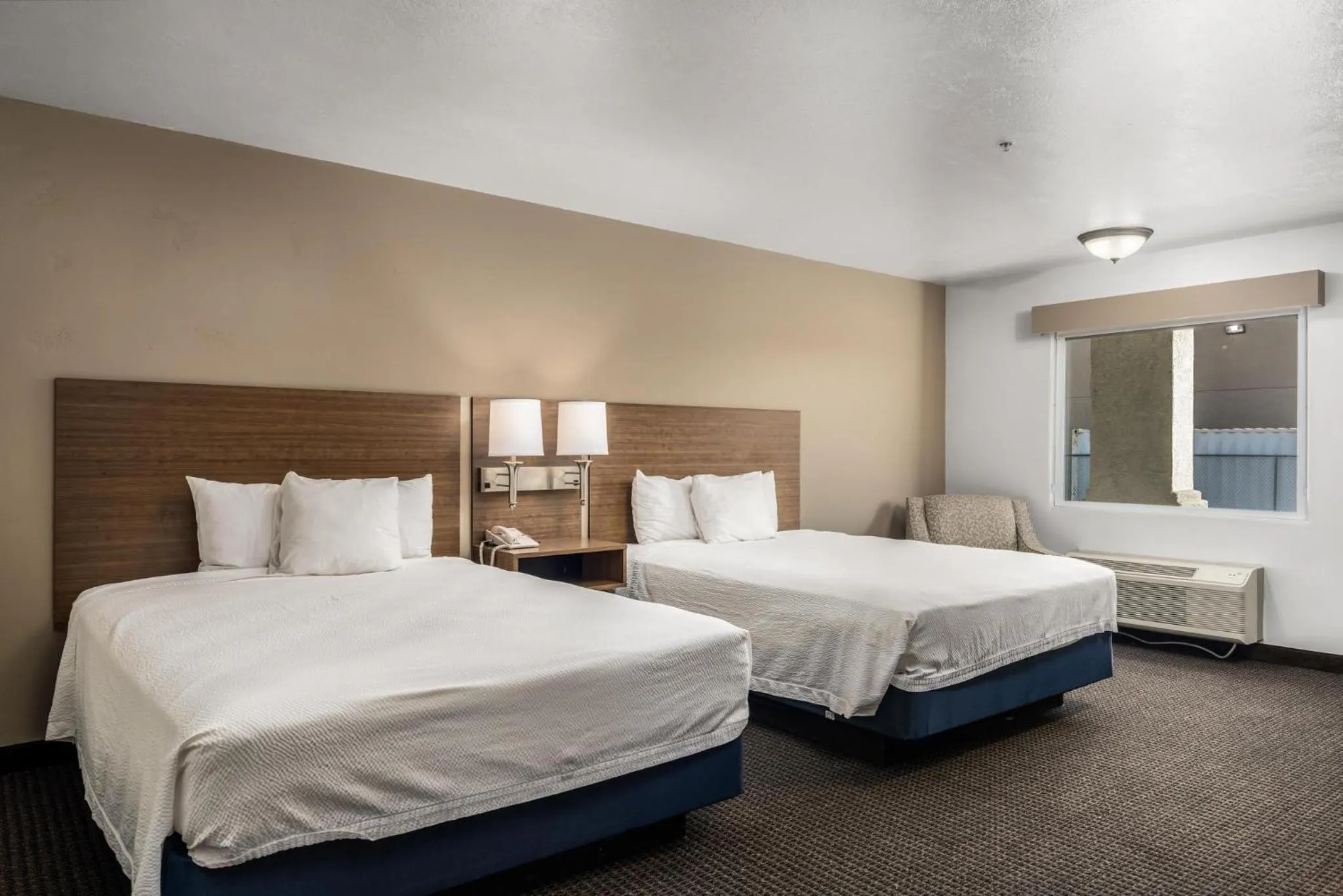 Bed in St. George Inn and Suites
