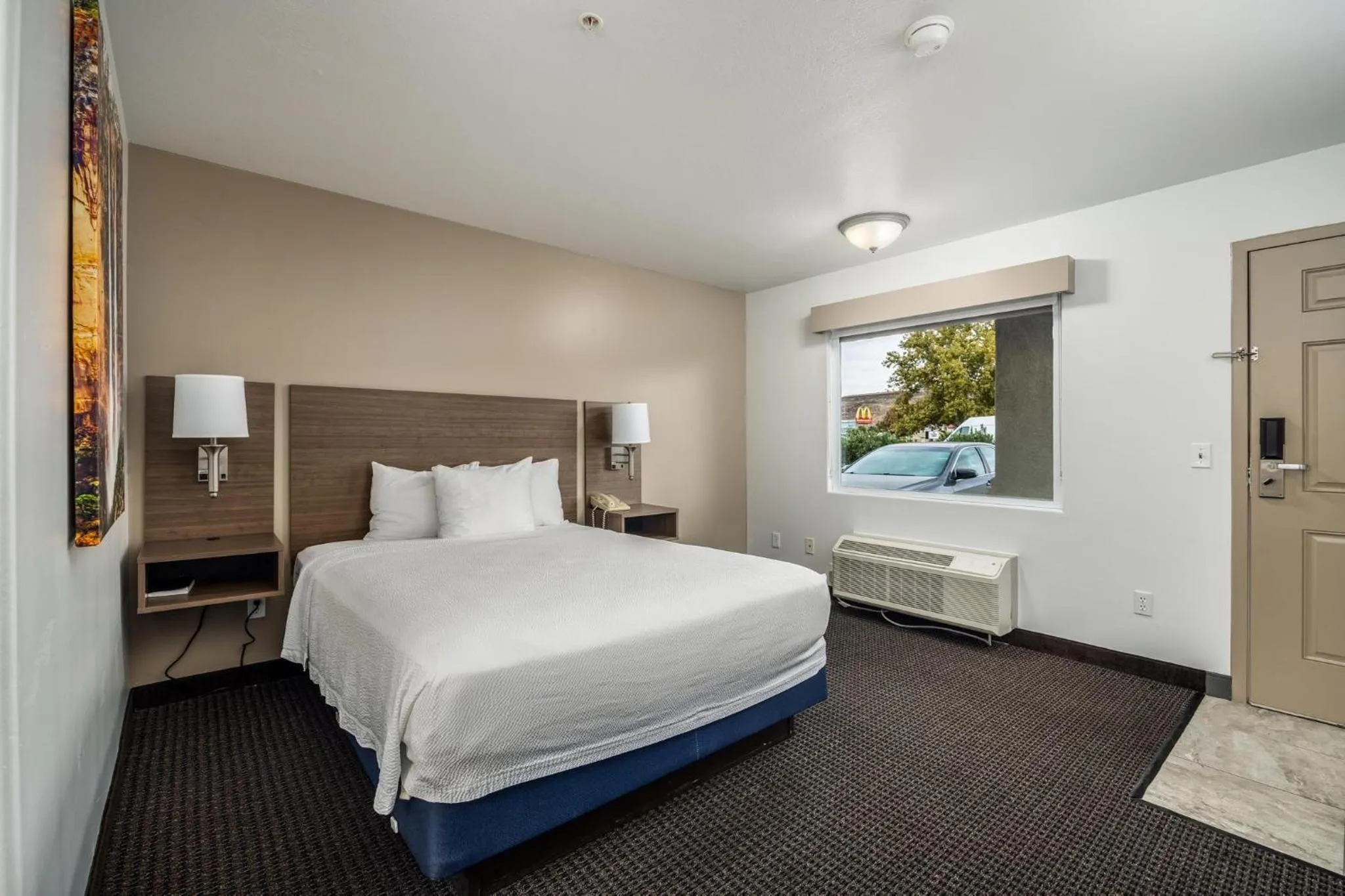 Bed in St. George Inn and Suites