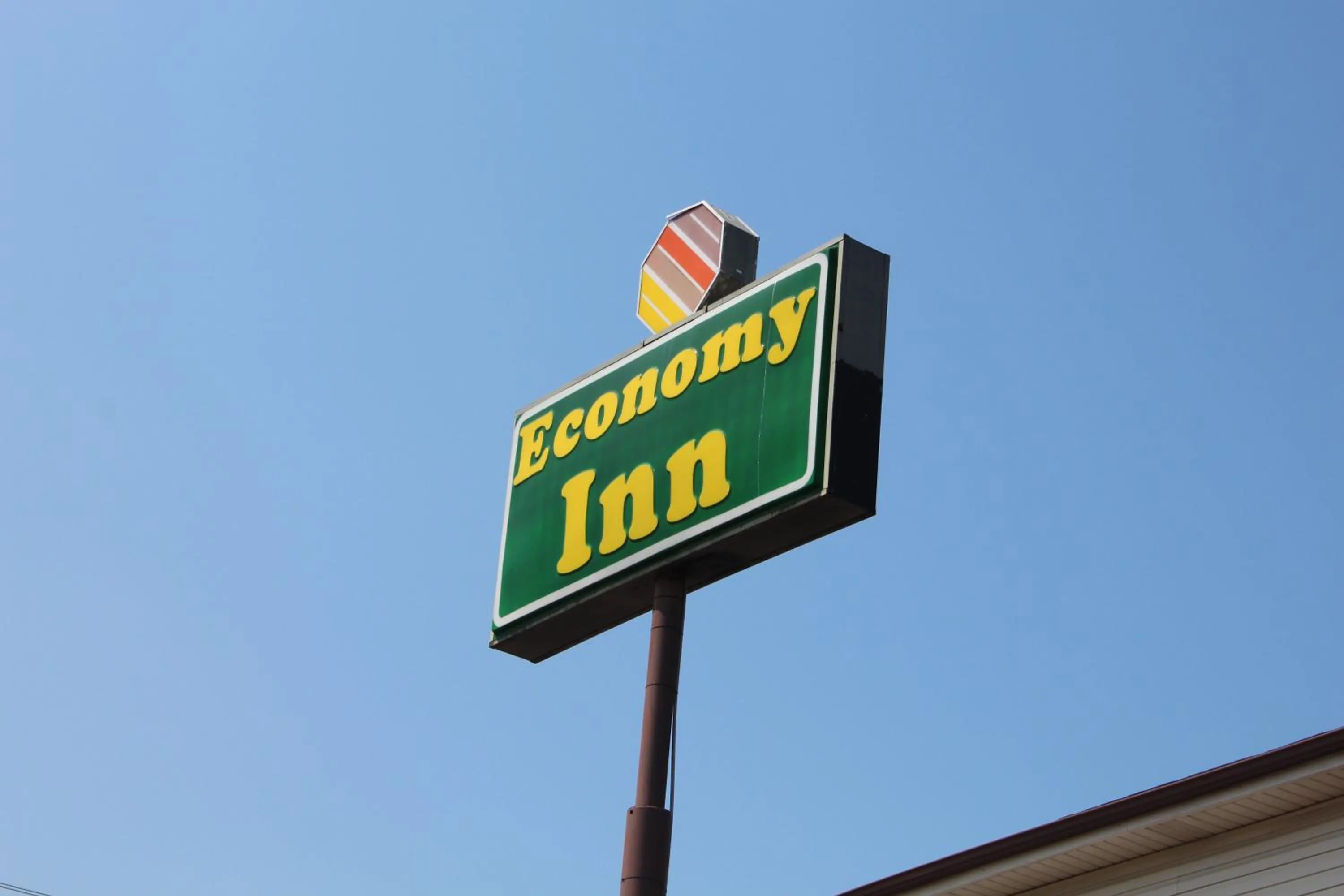 Property logo or sign in Economy Inn - Statesville