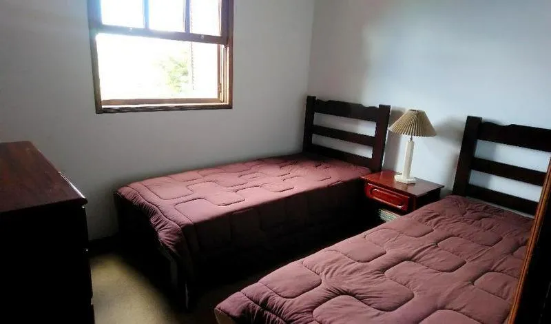 Bedroom, Bed in Apartamento Campos do Jordao