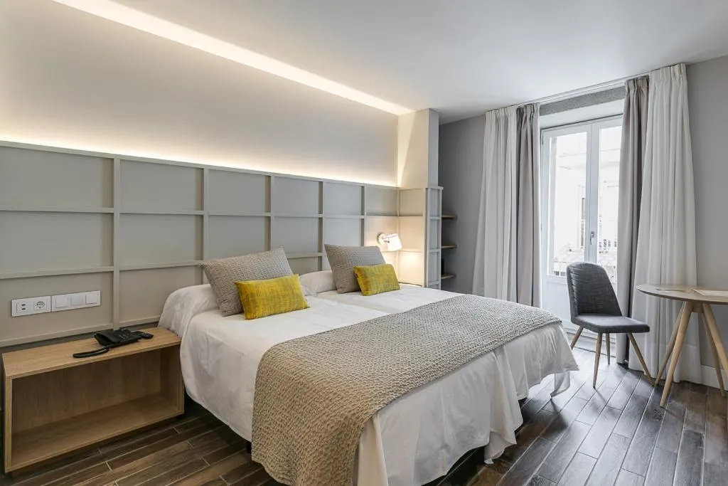 Bed in Hotel Pousada Real