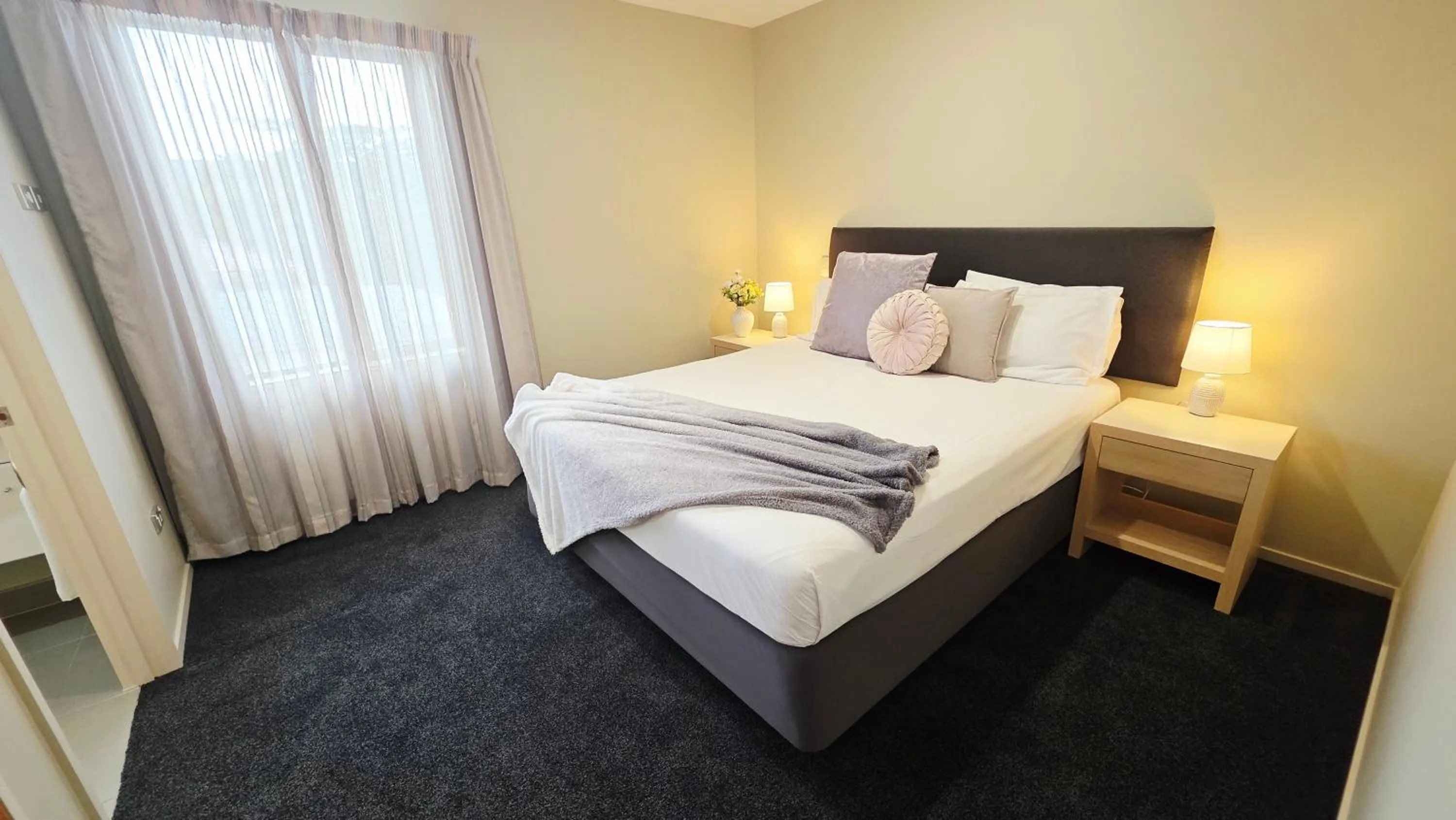 Bed in TOWER JUNCTION MOTOR LODGE - Airport and Christchurch railway station Shuttle Service