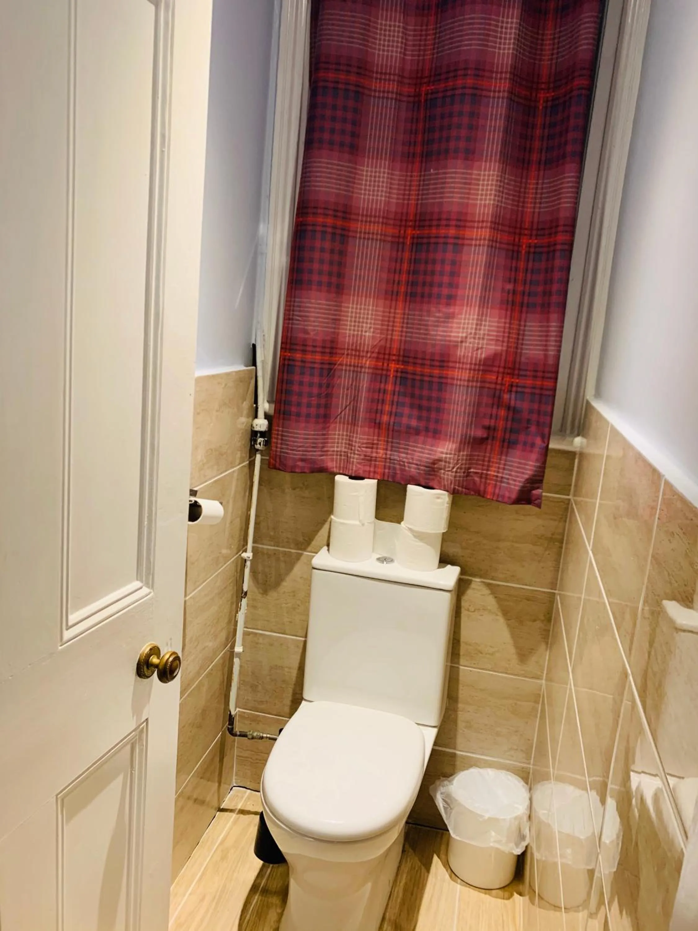 Toilet in Swandown Hotel