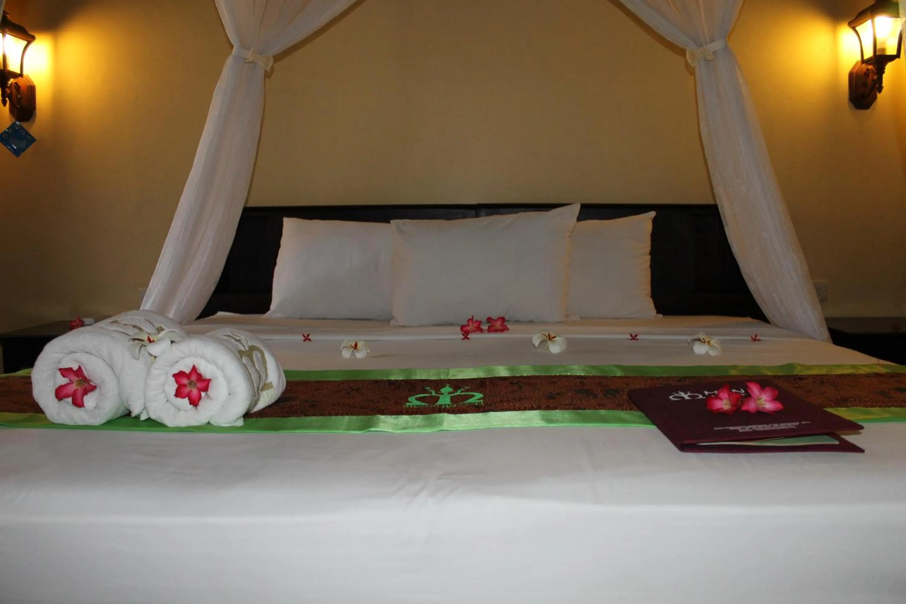 Bed in Mans Cottages & Spa
