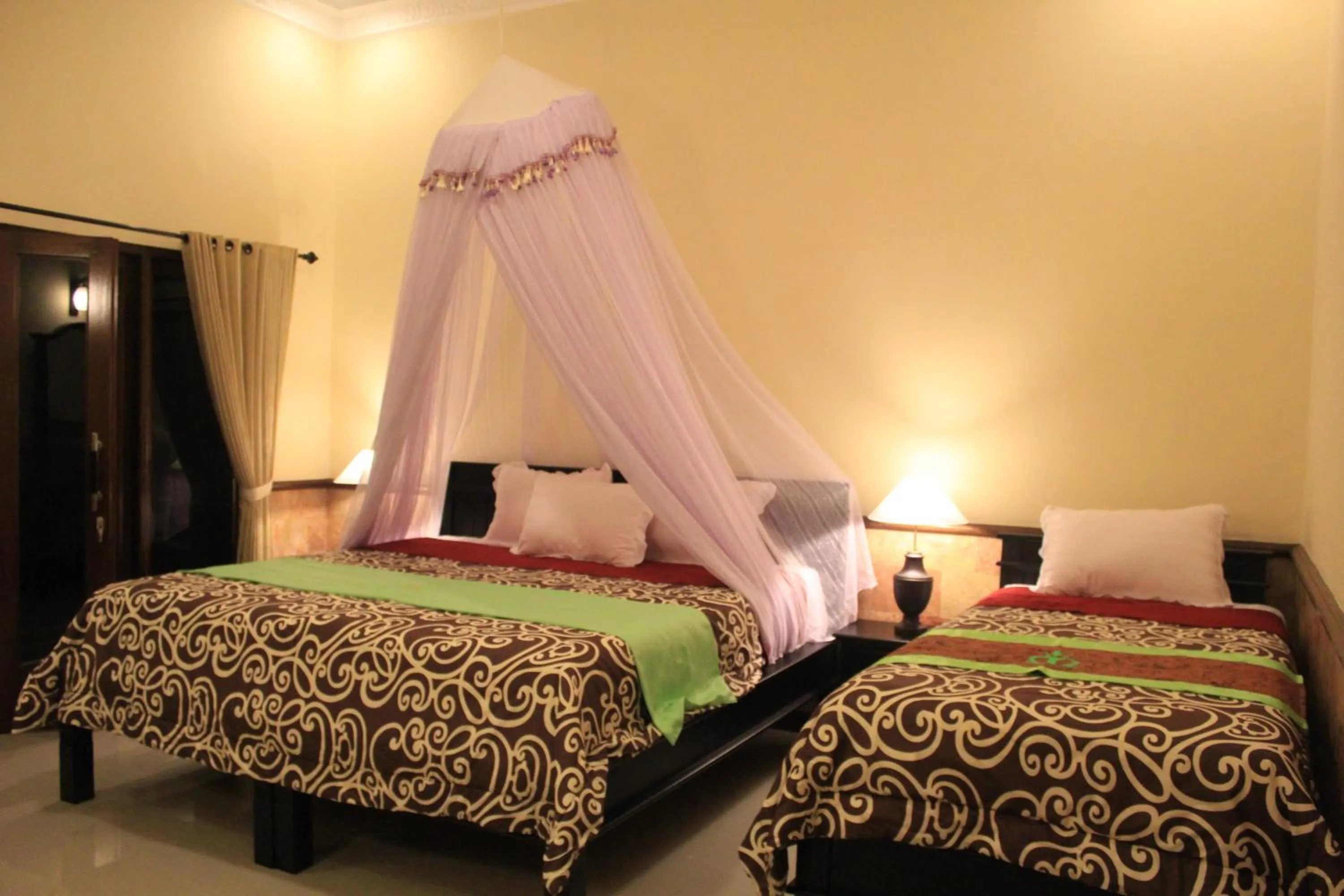 Bed in Mans Cottages & Spa