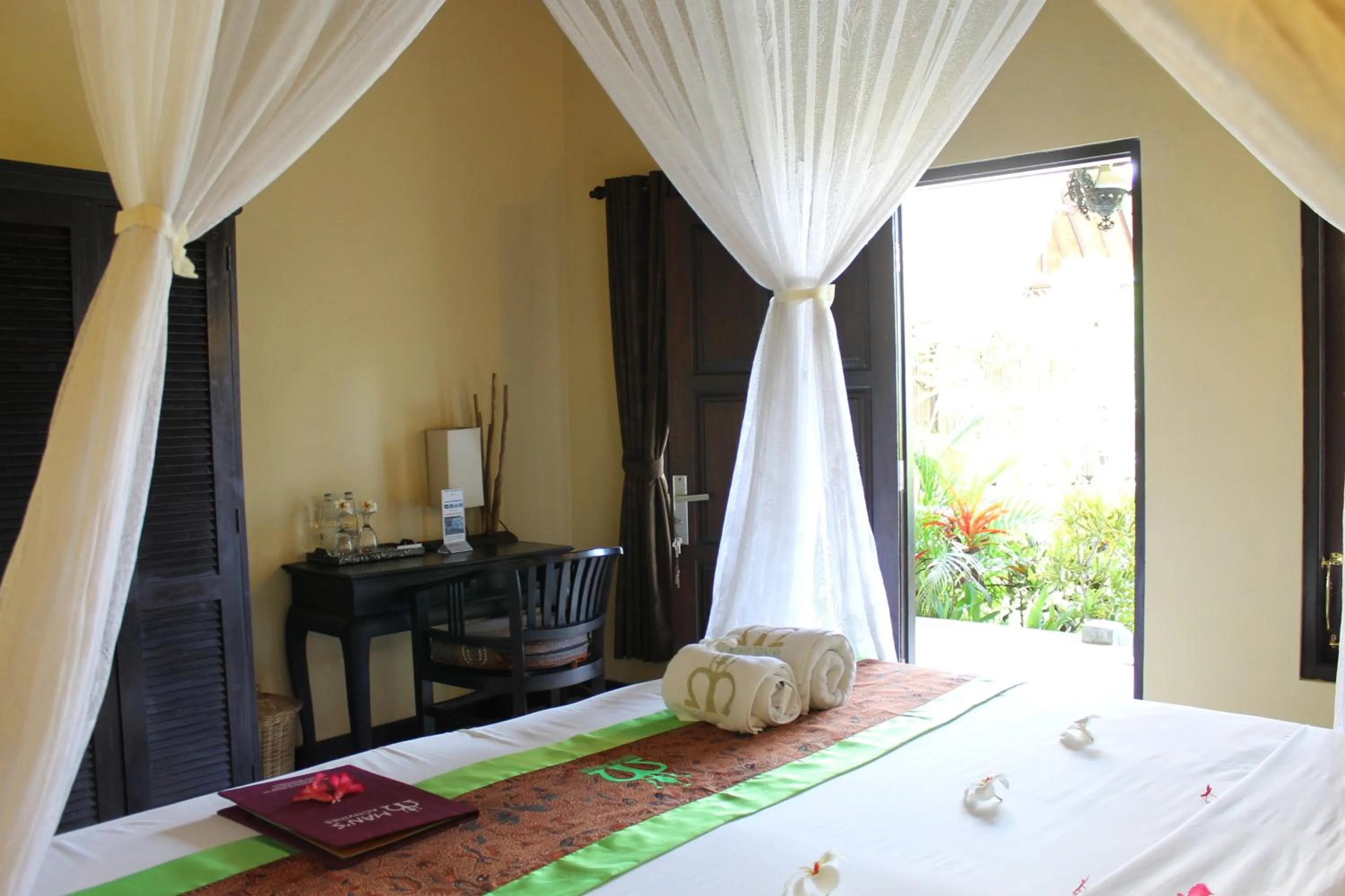 Bed in Mans Cottages & Spa