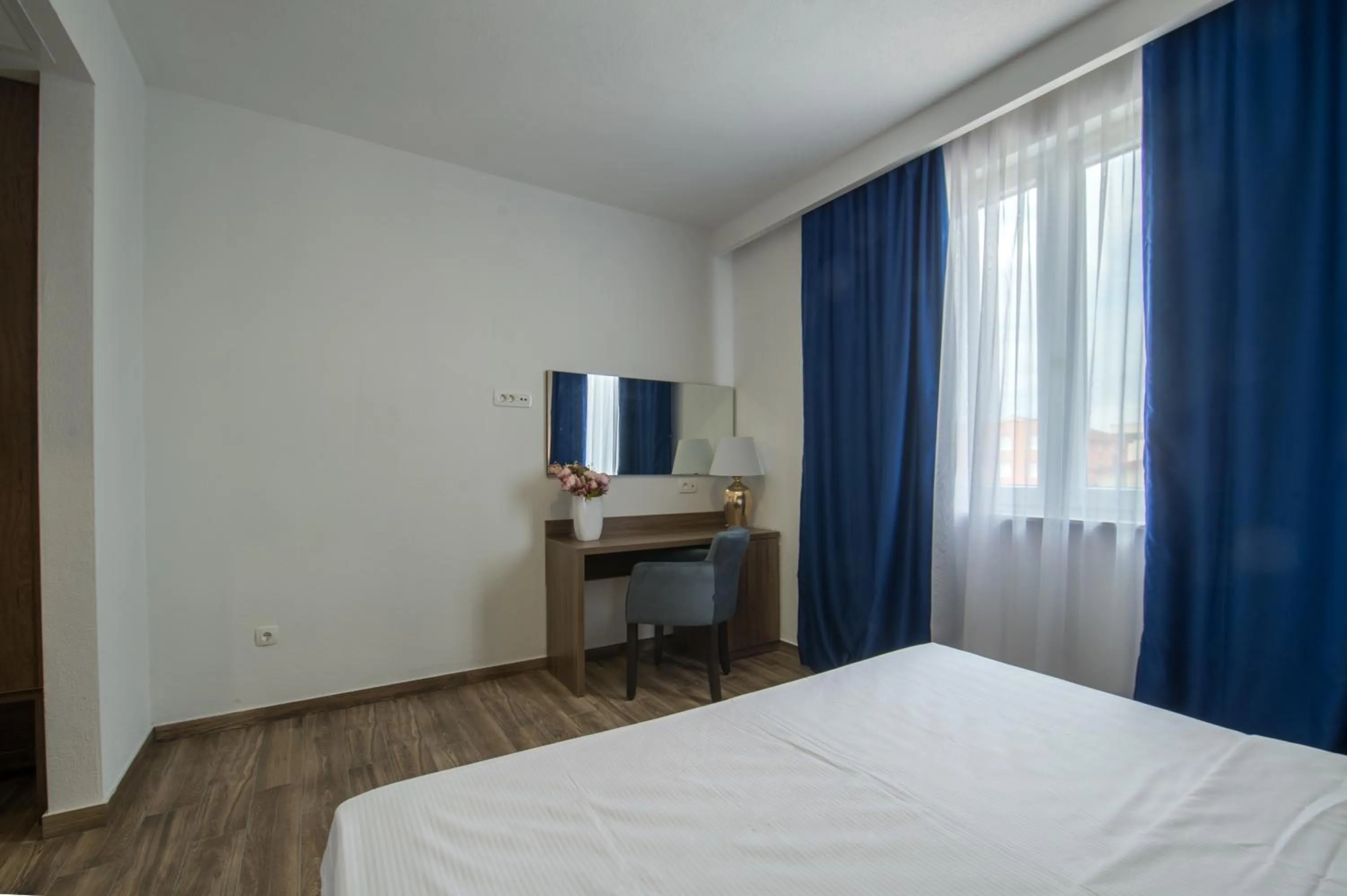 Hotel Tau