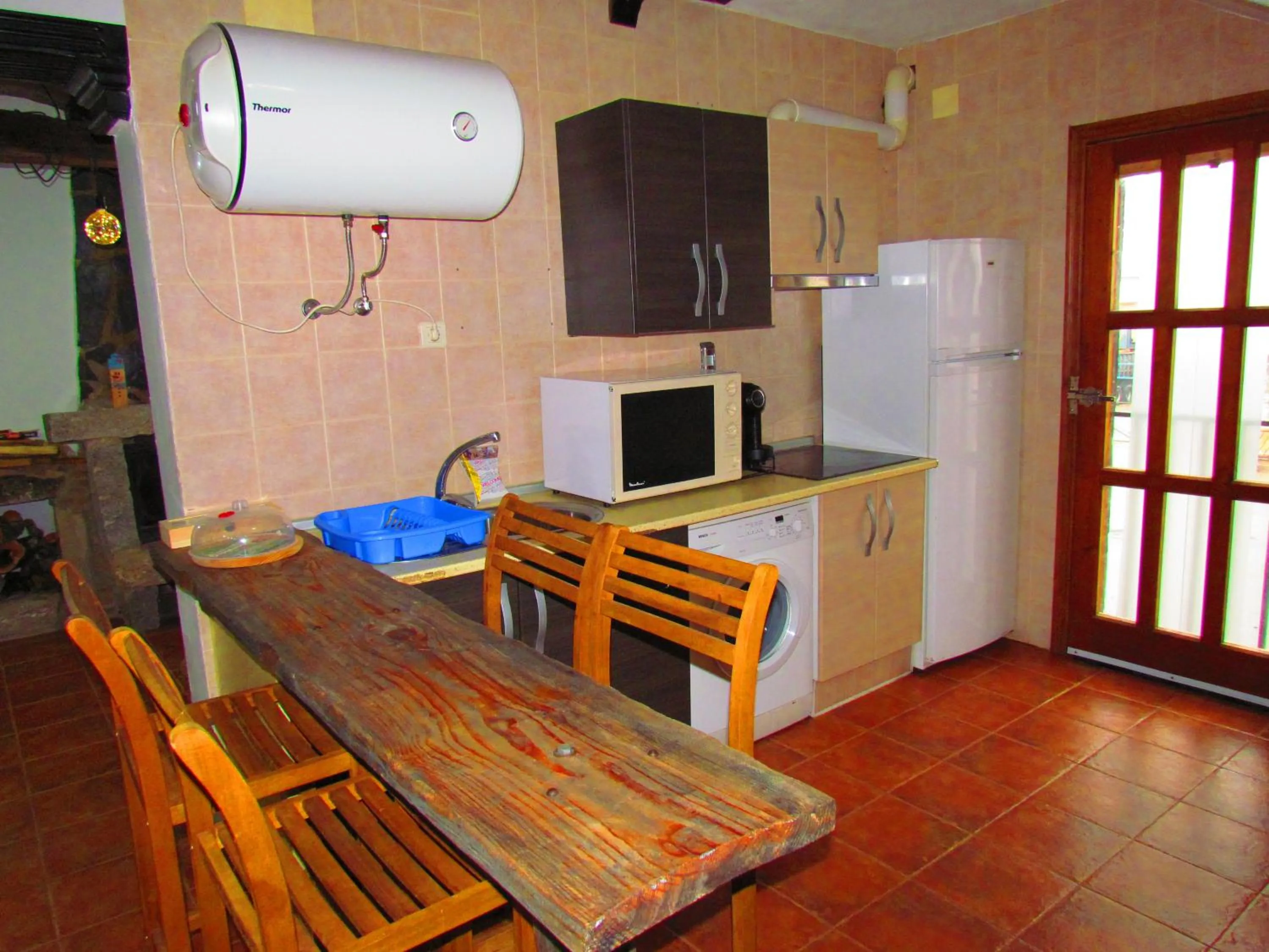 Kitchen or kitchenette in Apartamentos Casas Rurales "Paraje San Blas" TR-BA-00166