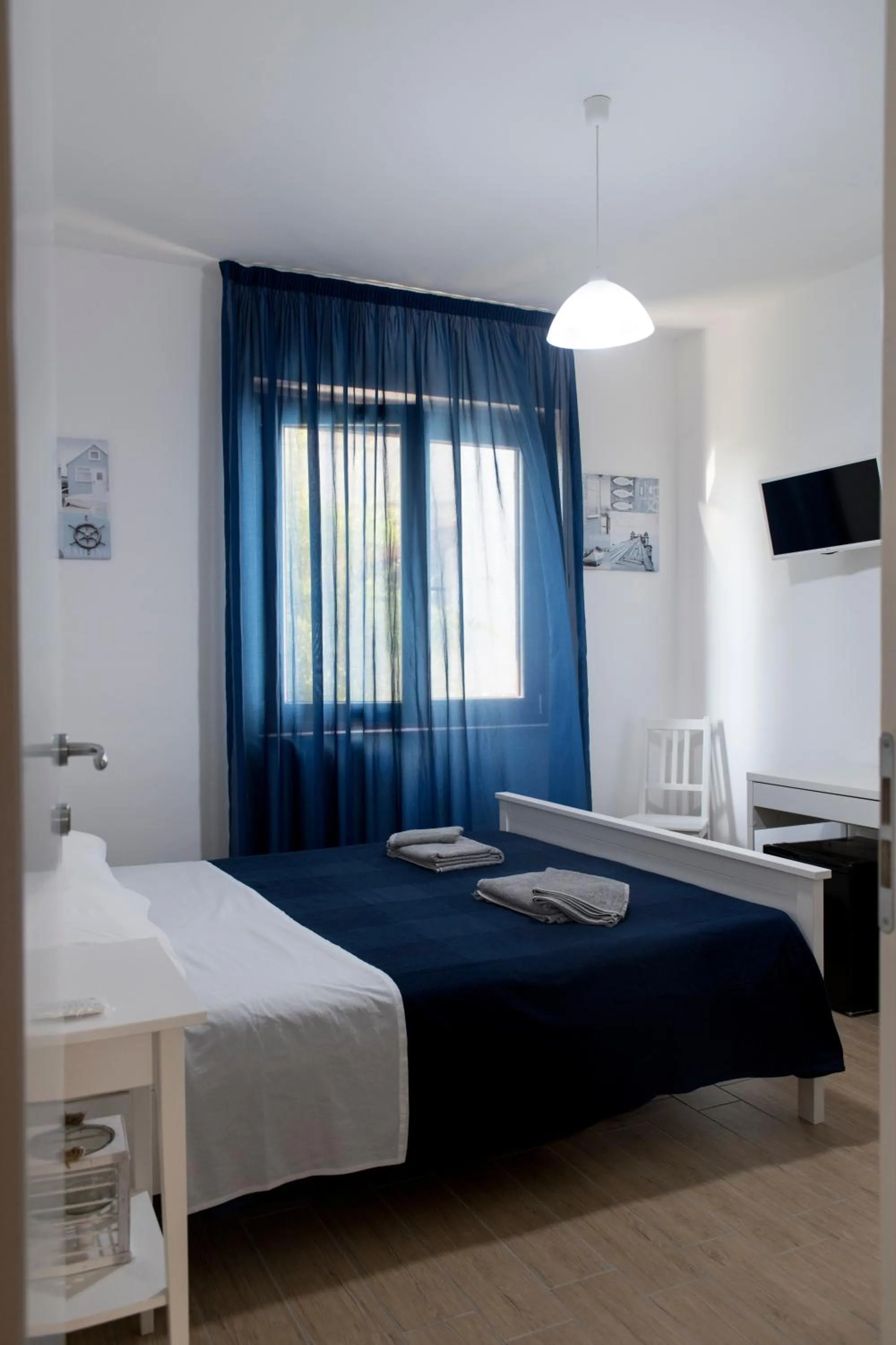 Photo of the whole room, Bed in L'oasi di Giorgia