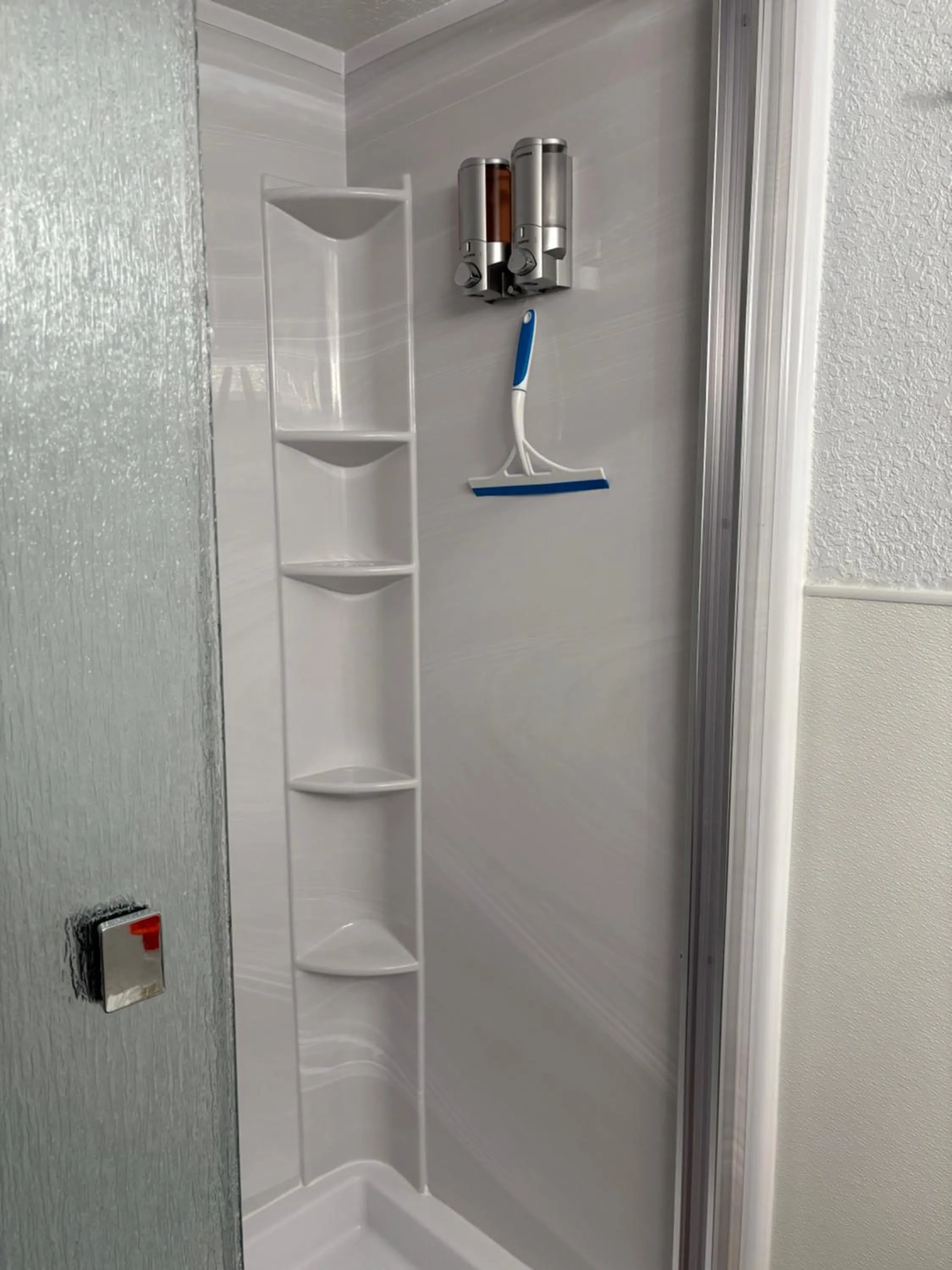 Shower in The Victorian Condo/Hotel