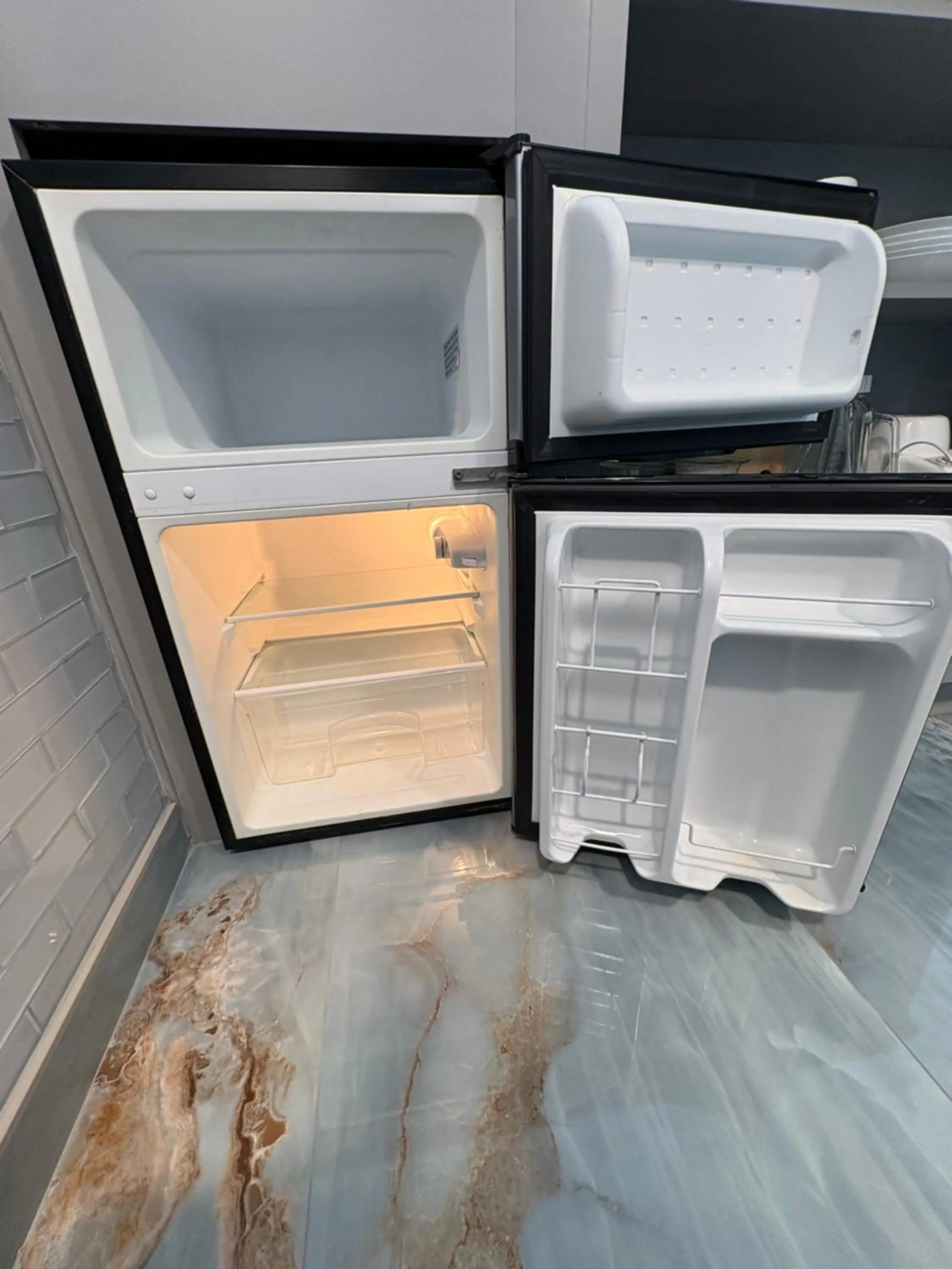 Kitchen or kitchenette in The Galveston Victorian Condo