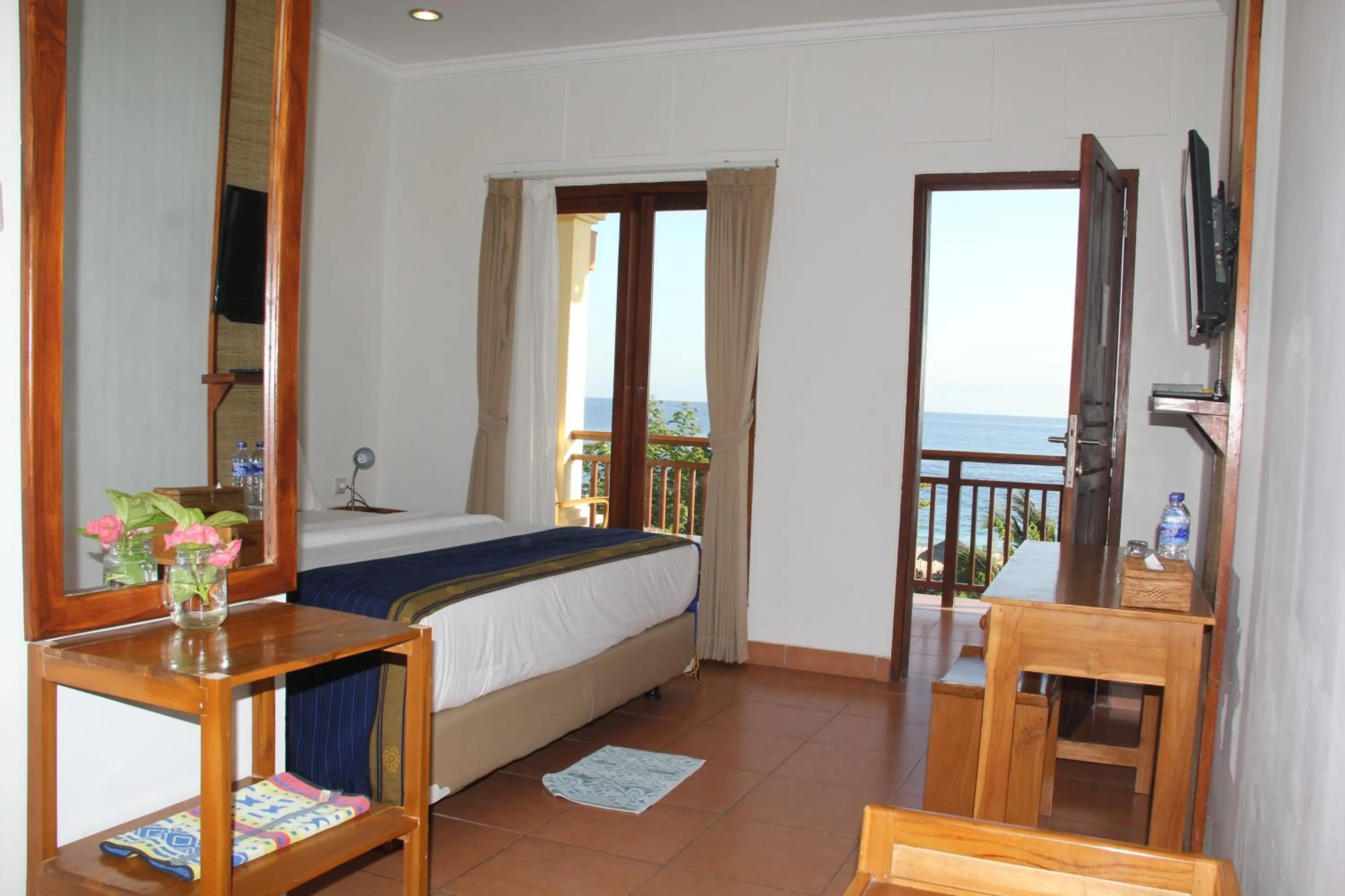 Bed in Mario Hotel and Cafe