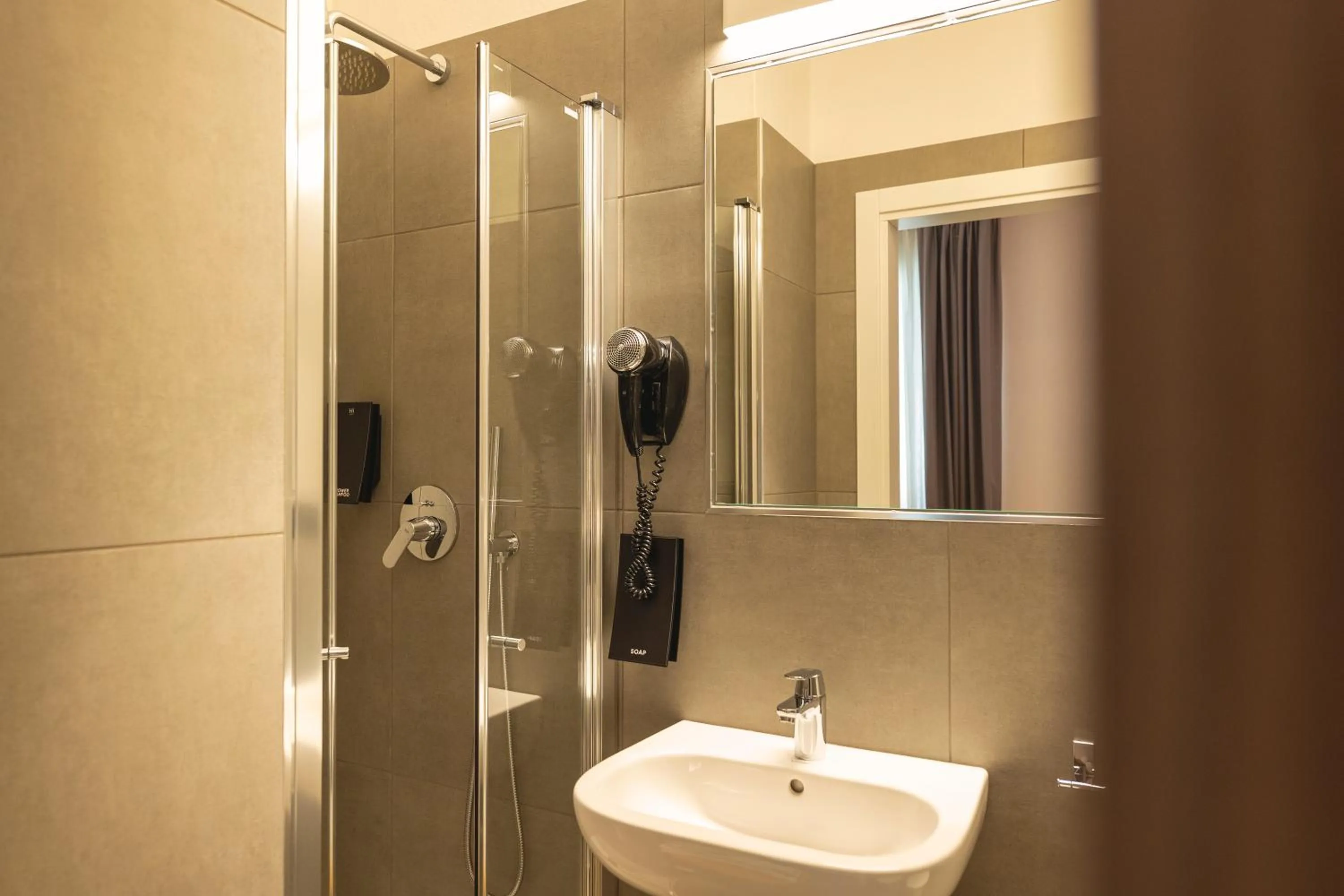 Bathroom in Hi Hotels Trento - Wellness & Spa Adults Only