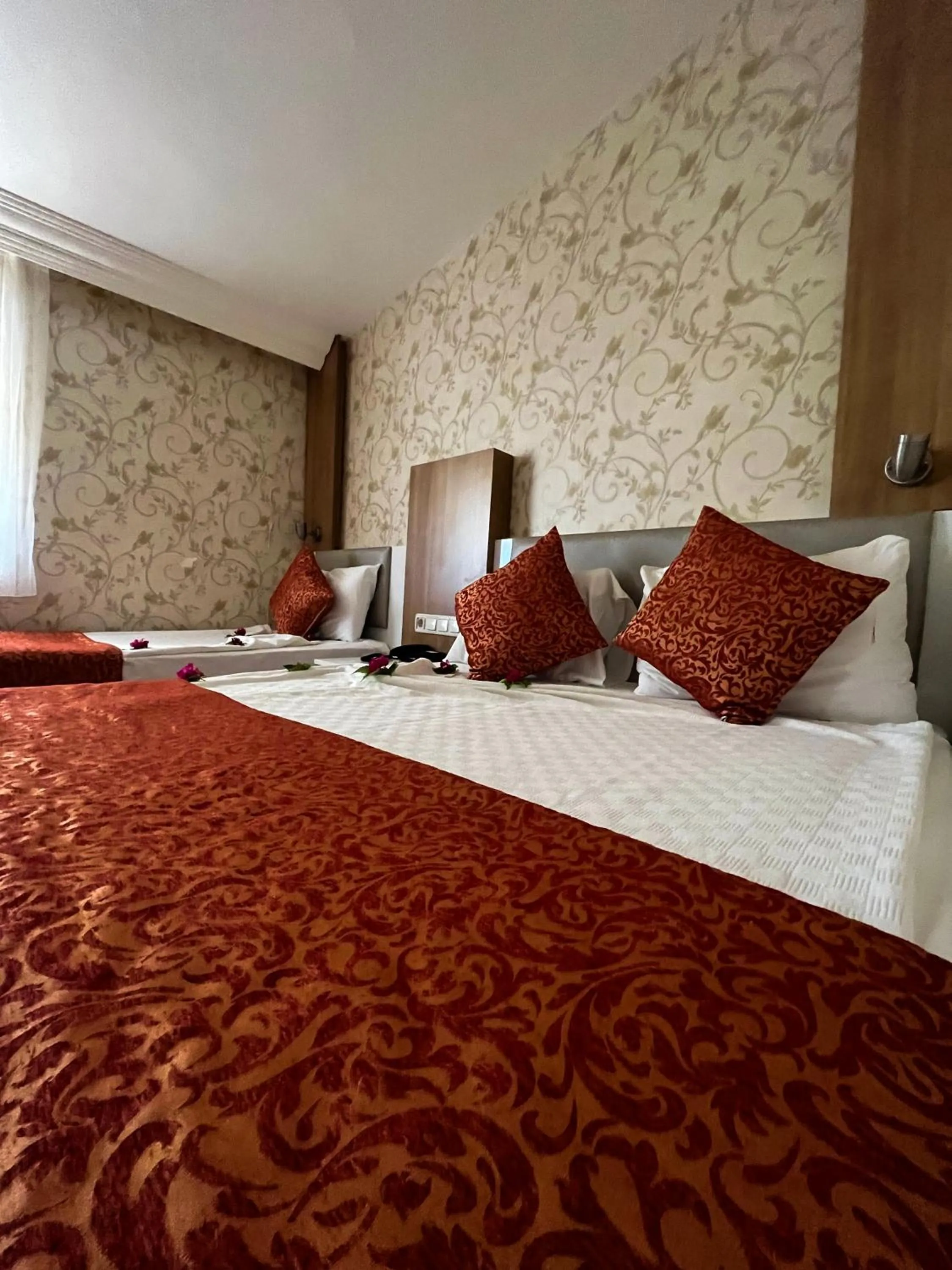 Bed in Aleria Belport Beach Hotel