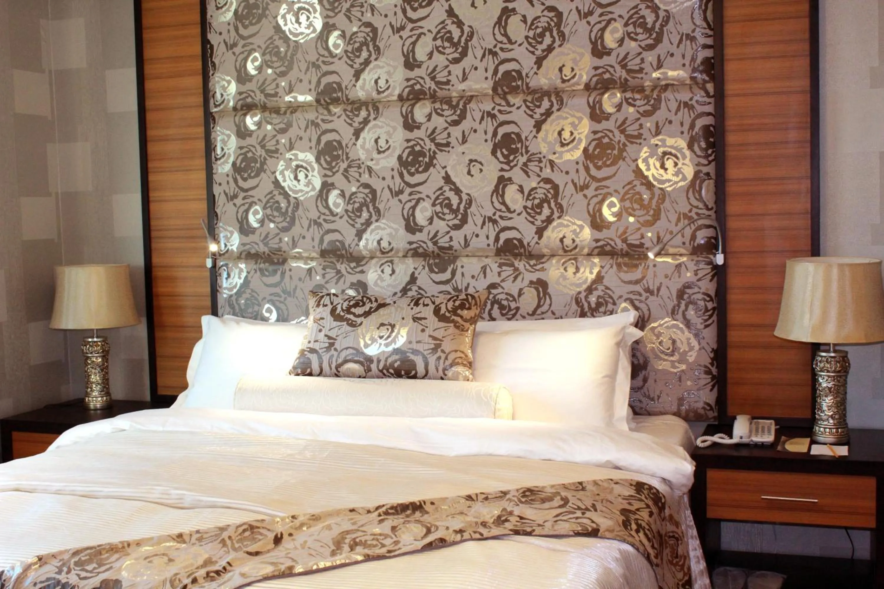 Bed in The Royal Mandaya Hotel