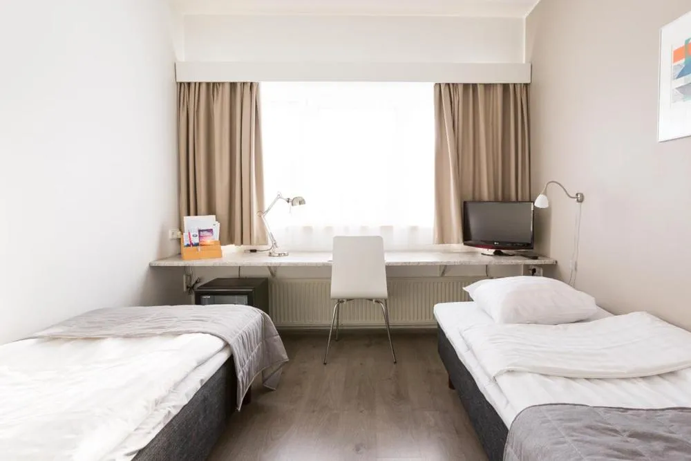 Photo of the whole room, Bed in Finlandia Hotel Alba