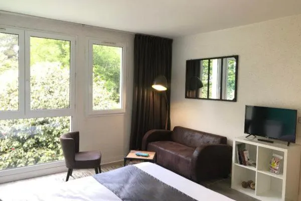 Bedroom in Logis Latitude Ouest Hôtel Restaurant & Spa