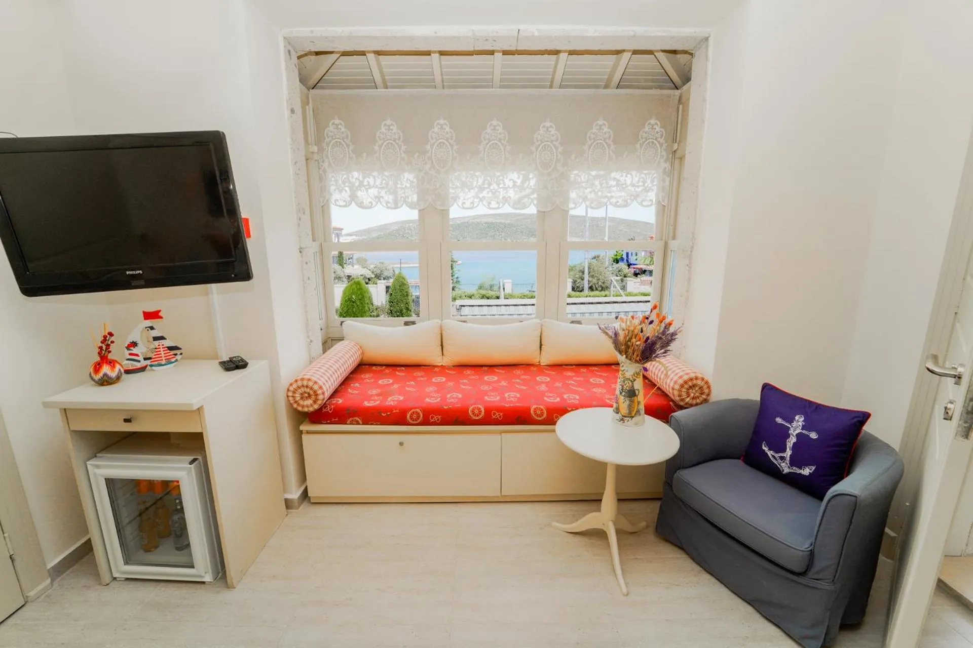 Seating area, Bed in Alacati Marina Palace