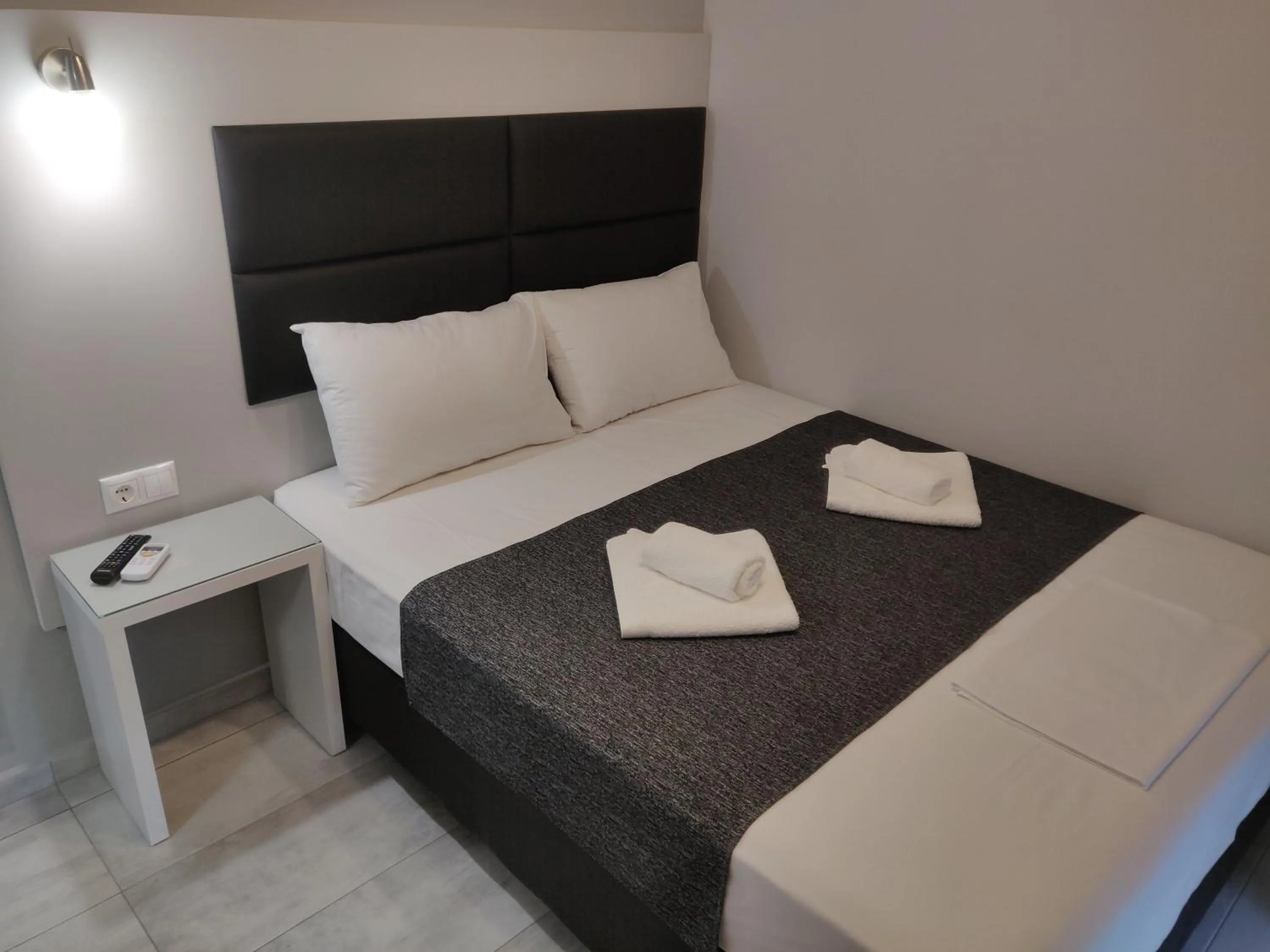 Bed in Alexion Apartments