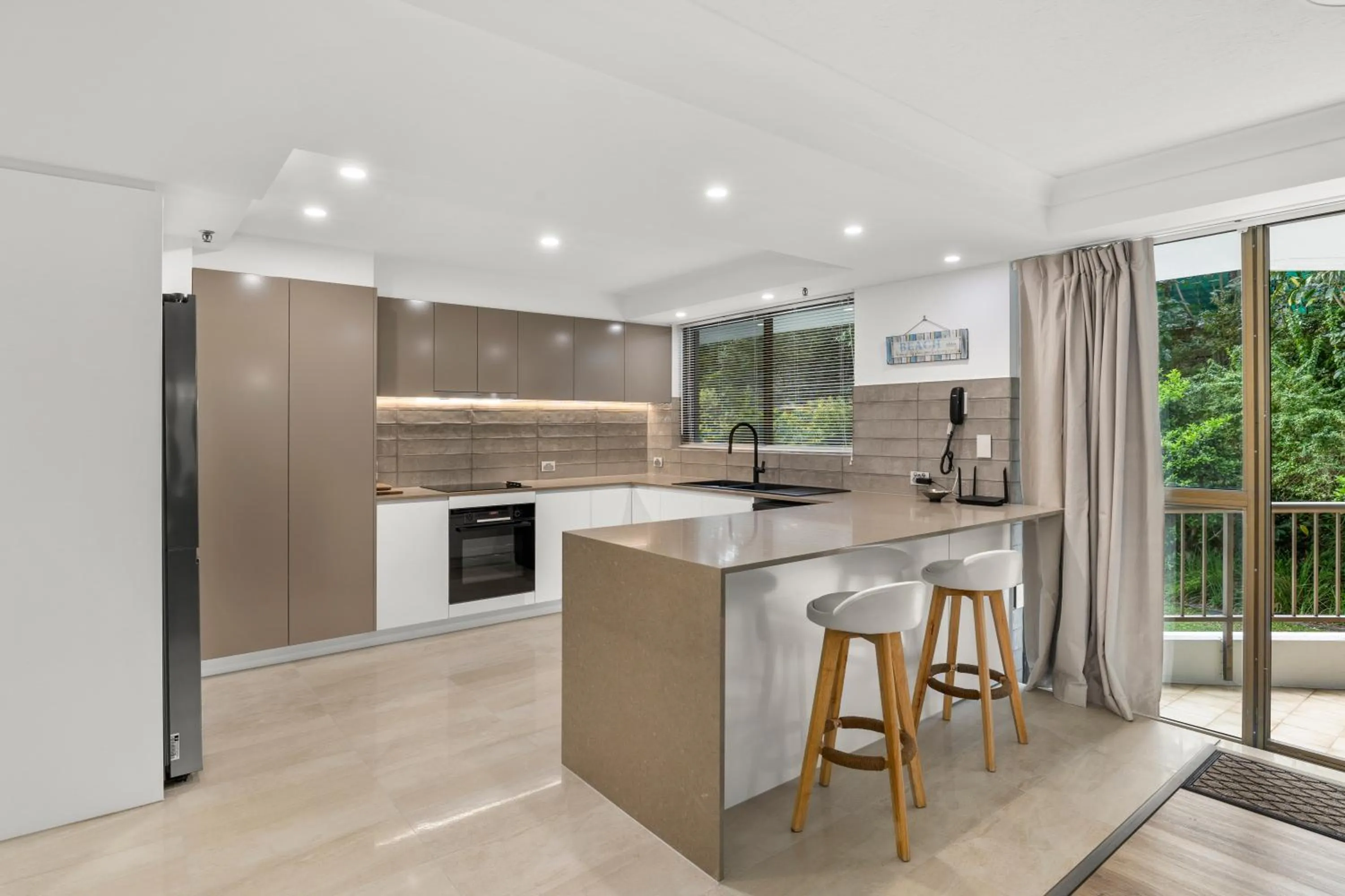 dishwasher in Gemini Court Holiday Apartments