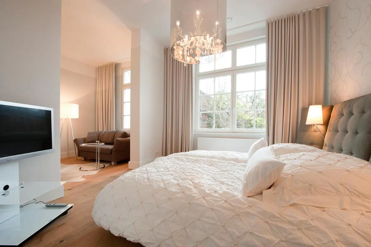 Photo of the whole room, Bed in Designhotel Rosenbohm