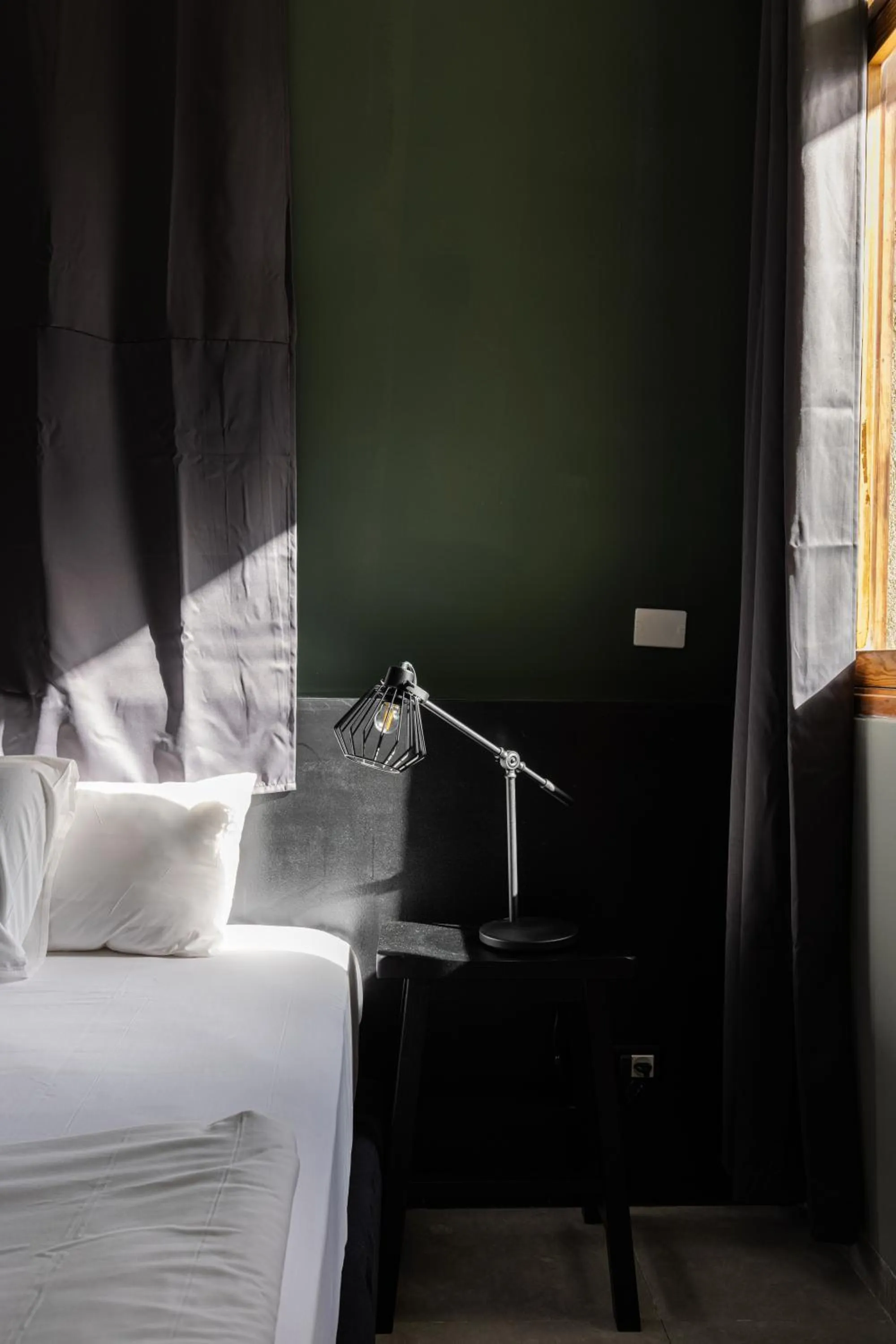 Bed in Residence Suites BY RAPHAEL HOTELS