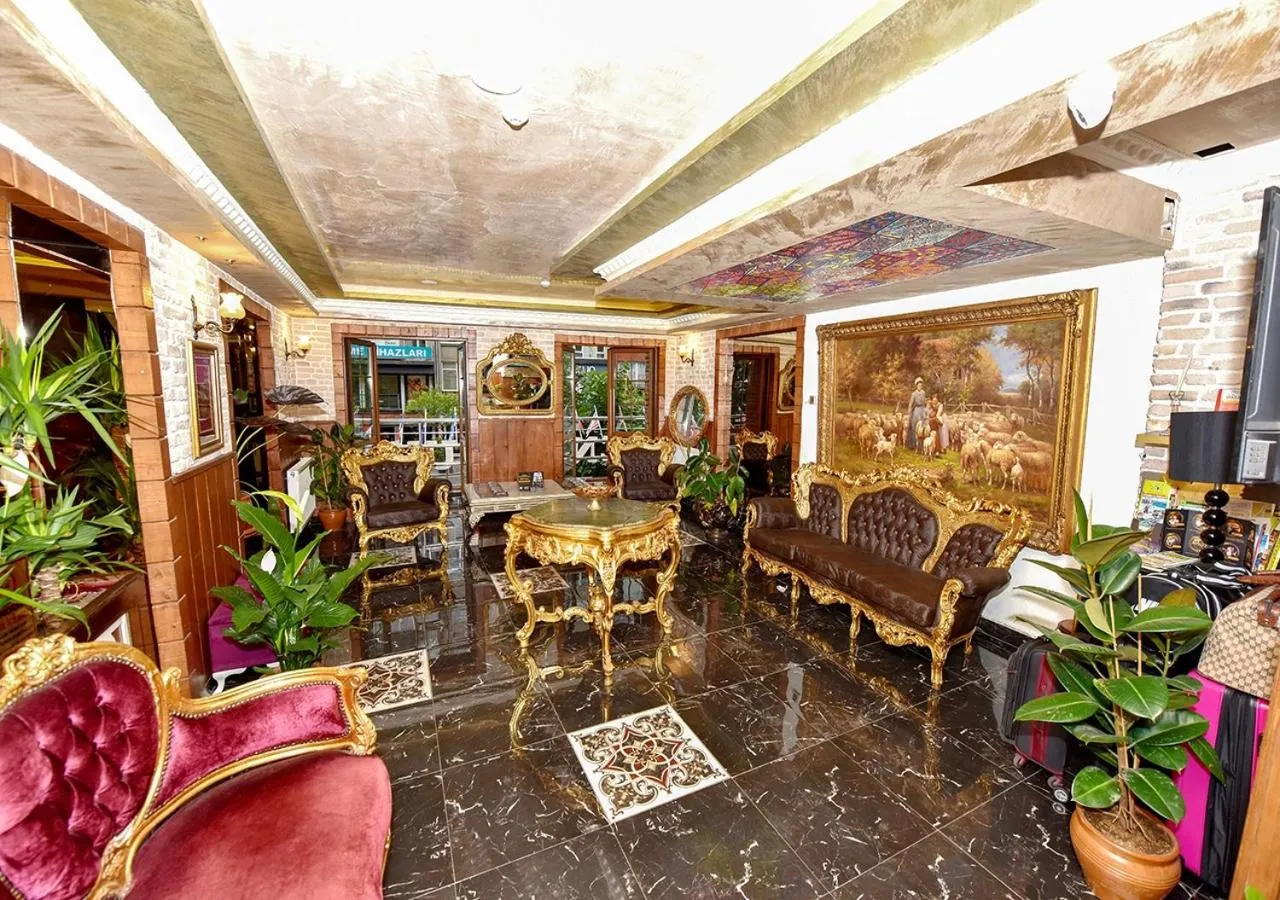 Seating area in Royal Garden Suite and Hotel