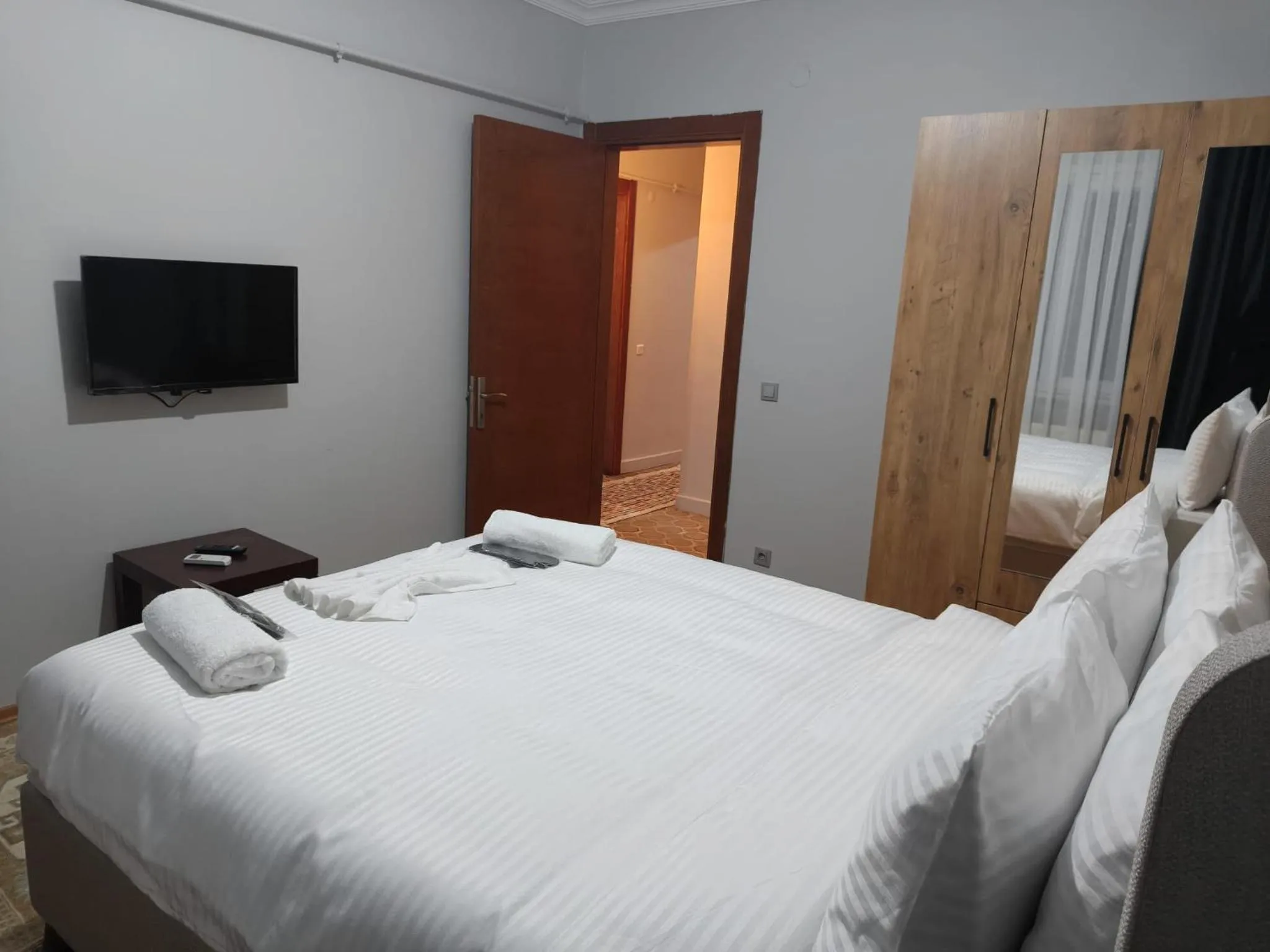 Bed in Royal Garden Suite and Hotel