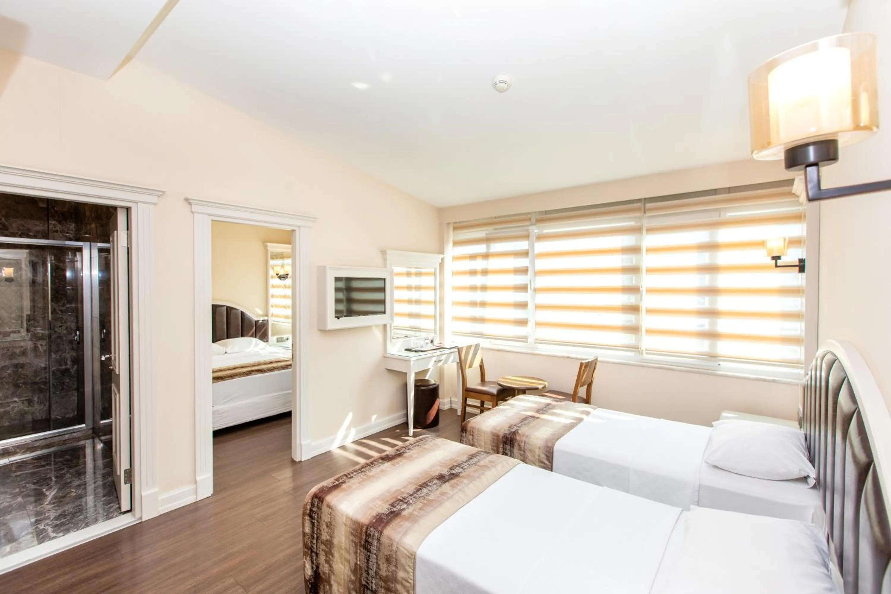 Bed in Baron Hotel & Spa