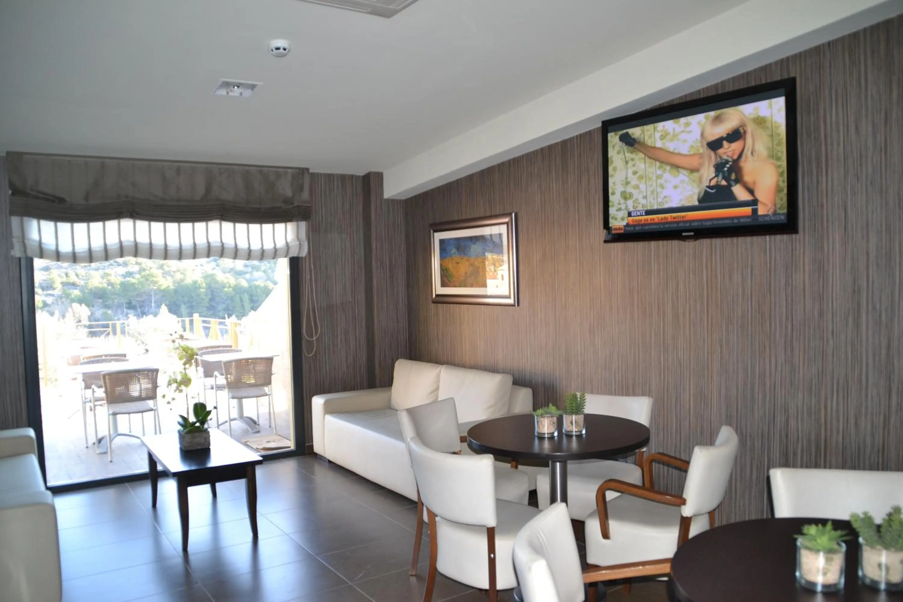 Communal lounge/ TV room in Hotel Vilar Riu de Baix