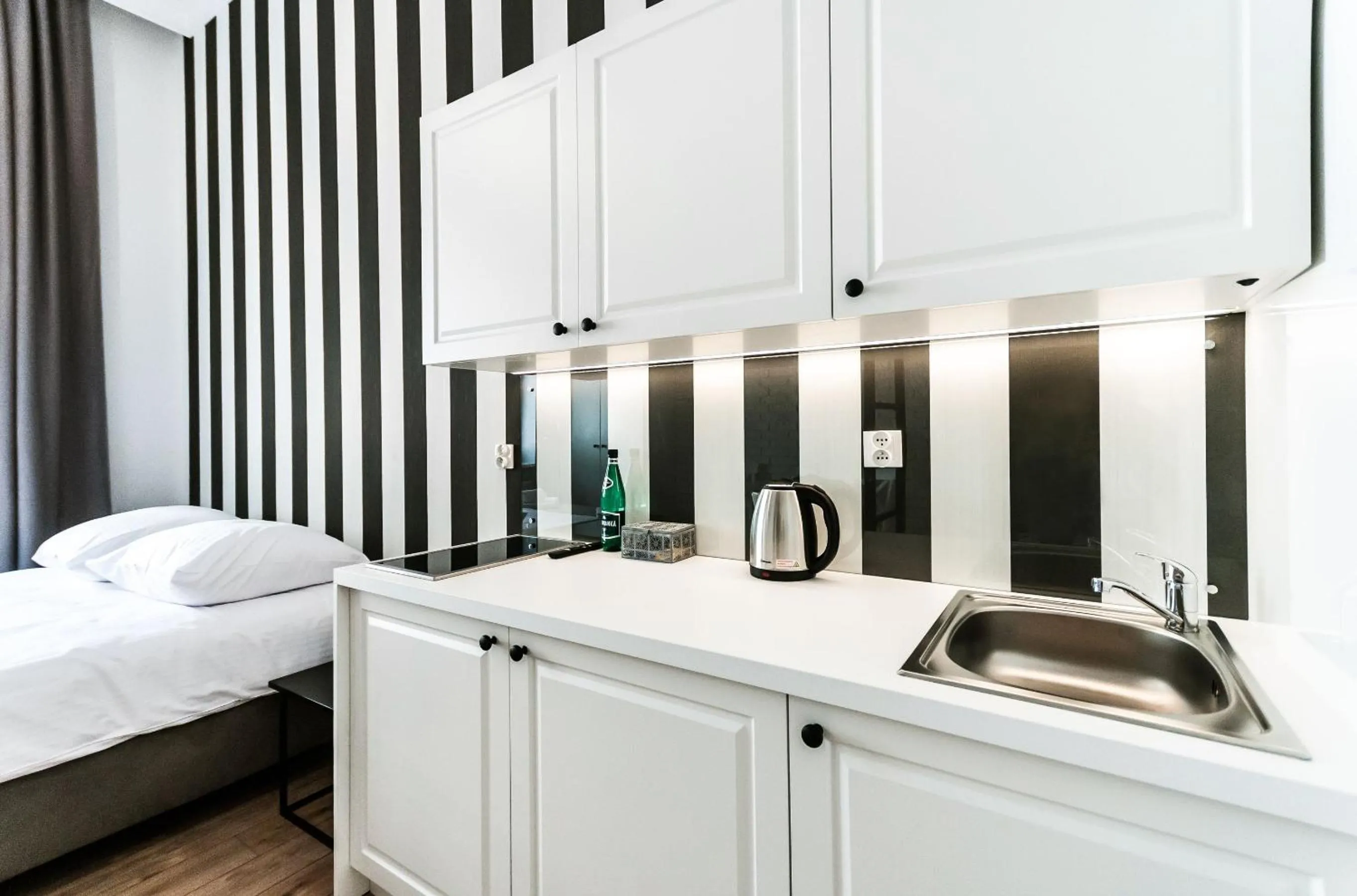 Kitchen or kitchenette, Bed in Apartamenty L5