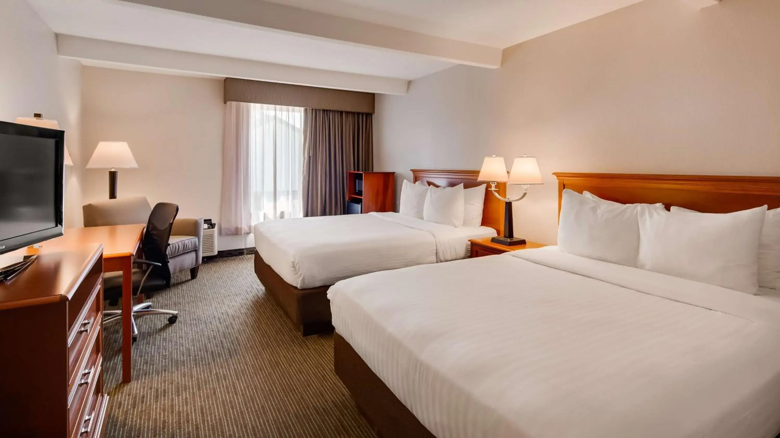 Double Room with Two Double Beds and Walk-In Shower - Disability Access/Non-Smoking in Best Western Tomah Hotel Double Room with Two Double Beds and Walk-In Shower - Disability Access/Non-Smoking in Best Western Tomah Hotel