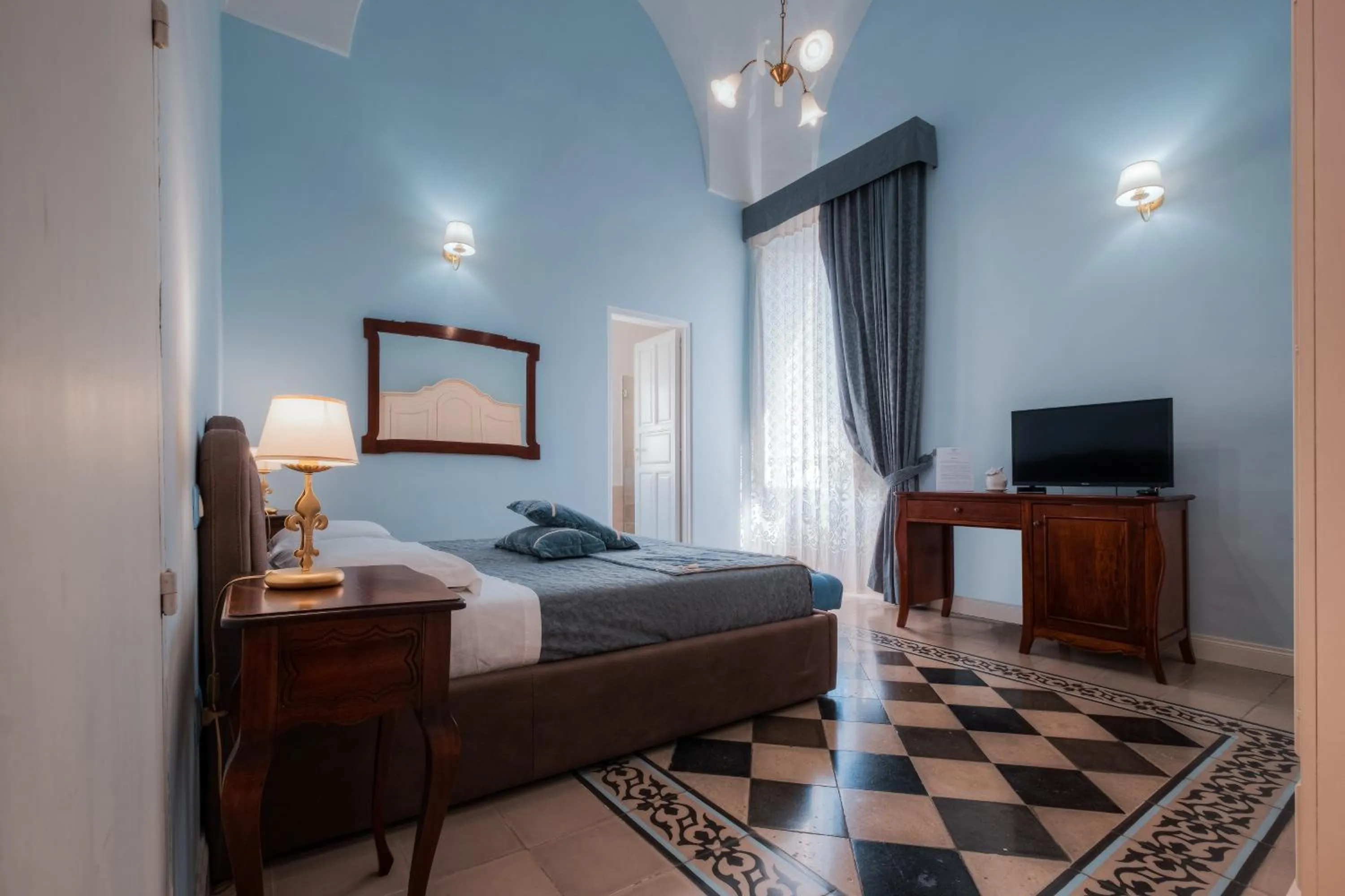 Bed in Relais Palazzo Vaglio