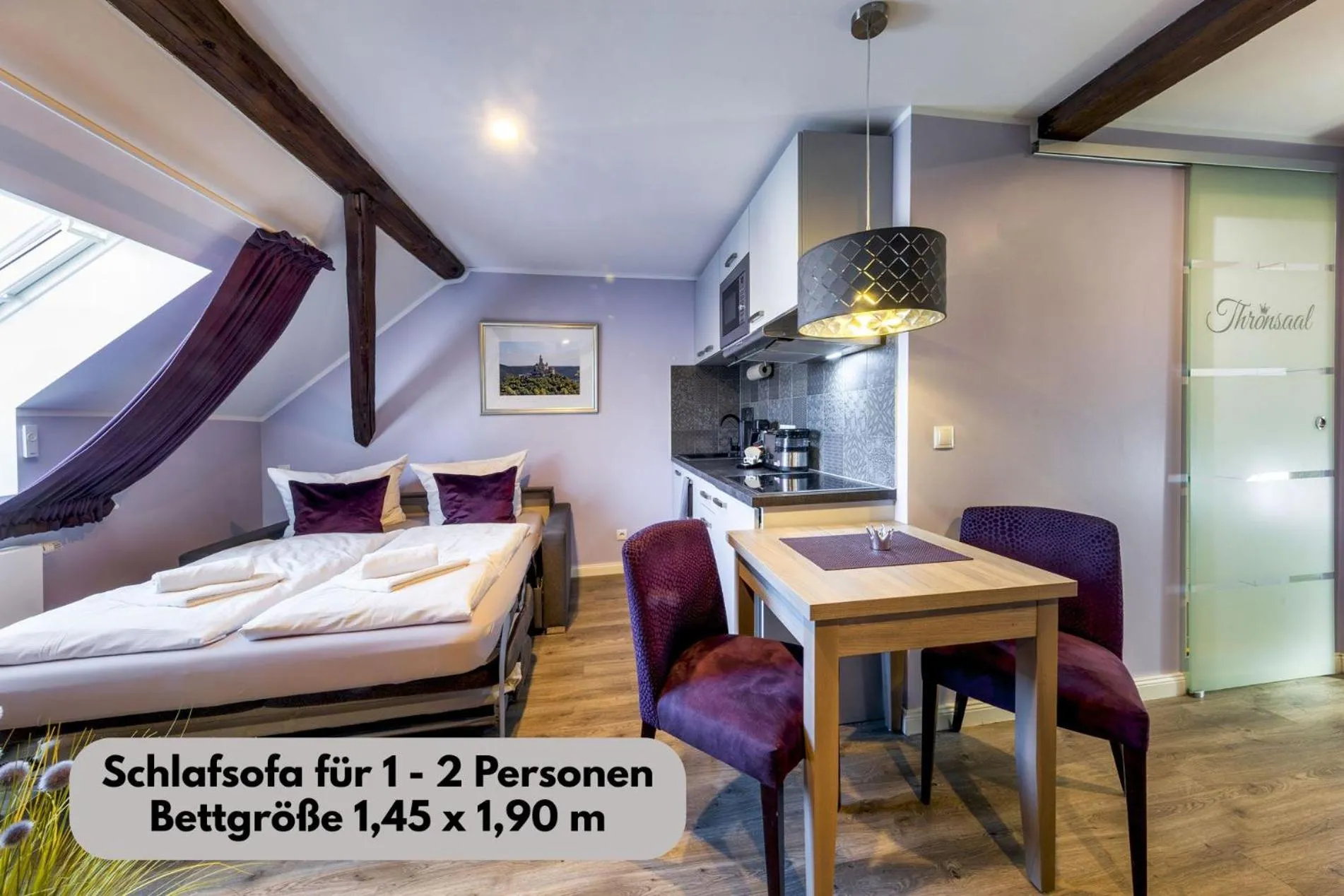 Bed in Apartmenthaus Burgenheimat in Rhens bei Koblenz