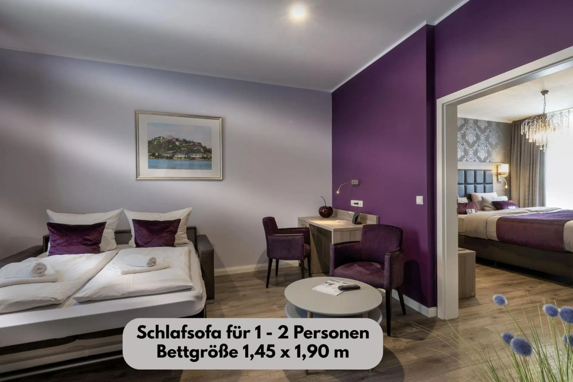 Bed in Apartmenthaus Burgenheimat in Rhens bei Koblenz