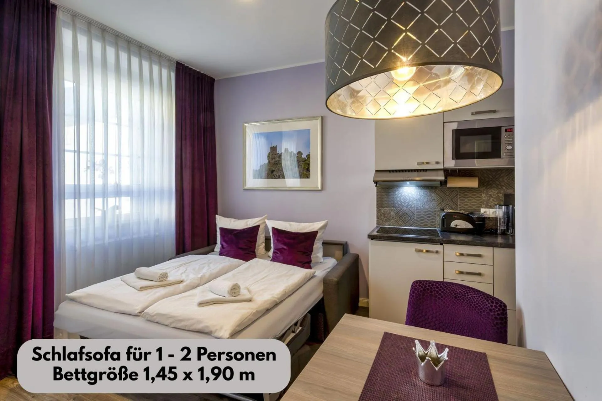 Bed in Apartmenthaus Burgenheimat in Rhens bei Koblenz