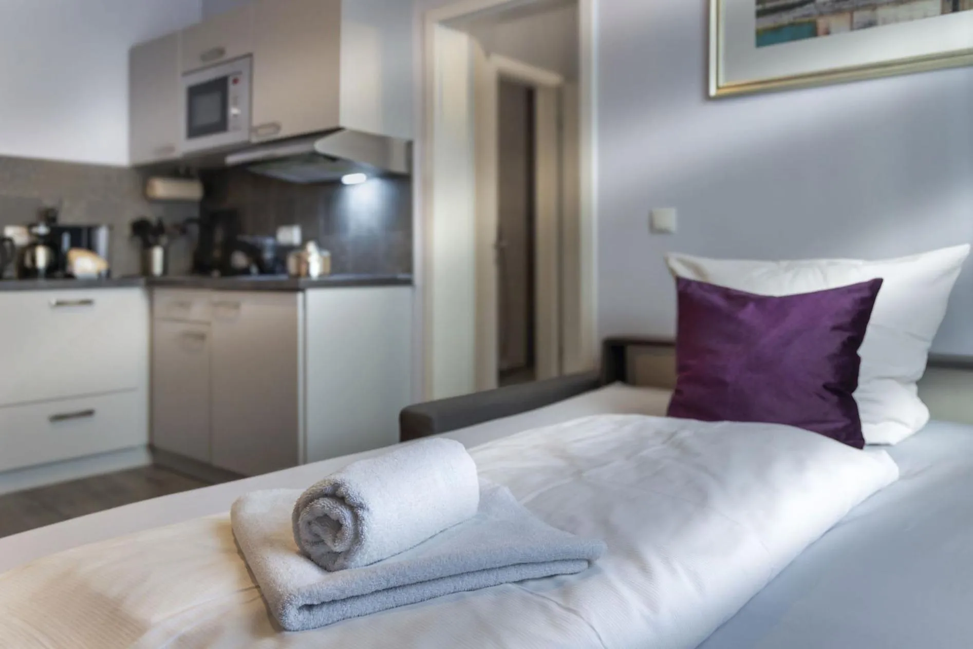 Bed in Apartmenthaus Burgenheimat in Rhens bei Koblenz