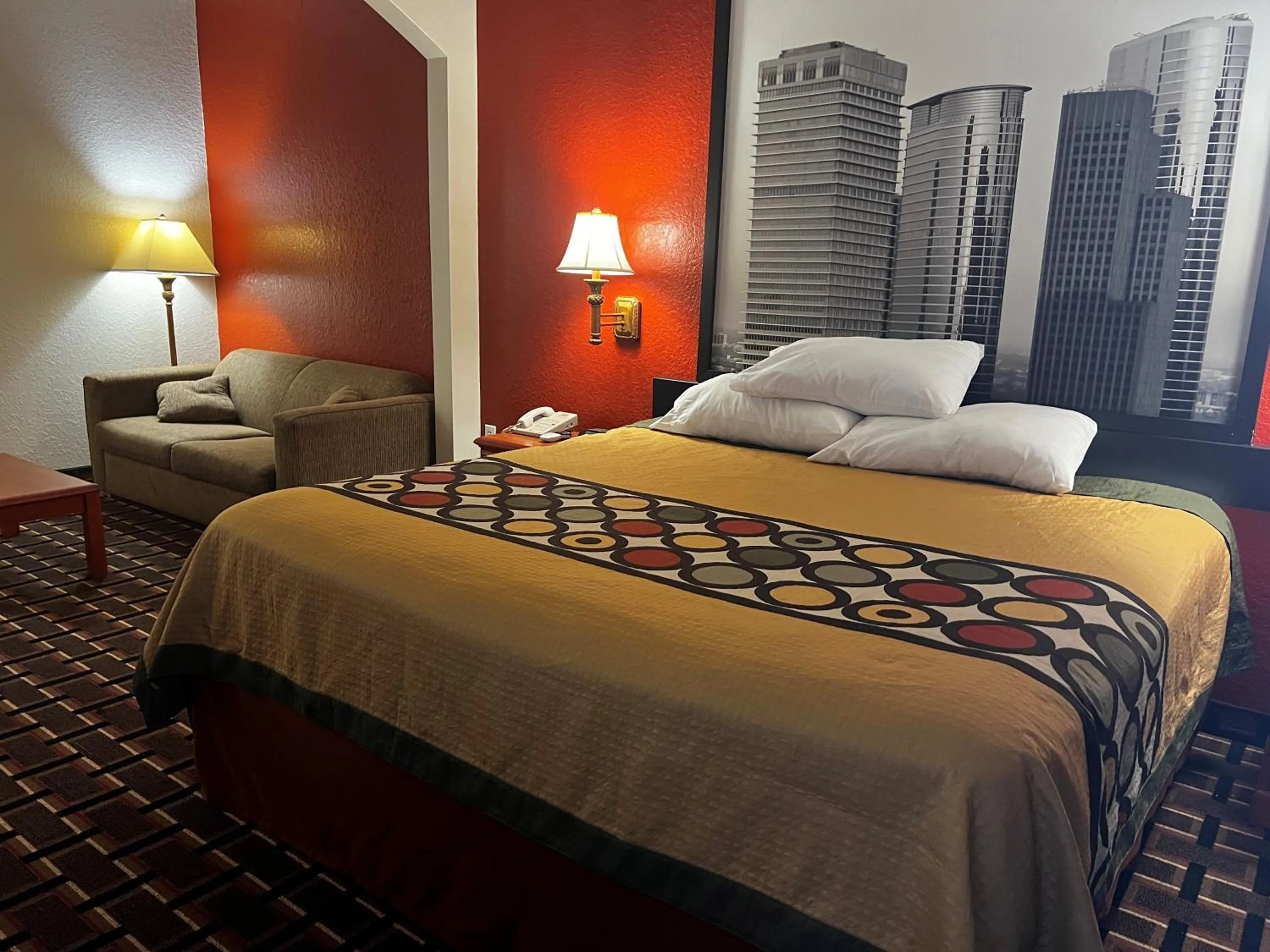 Bed in Super 8 by Wyndham Brookshire TX