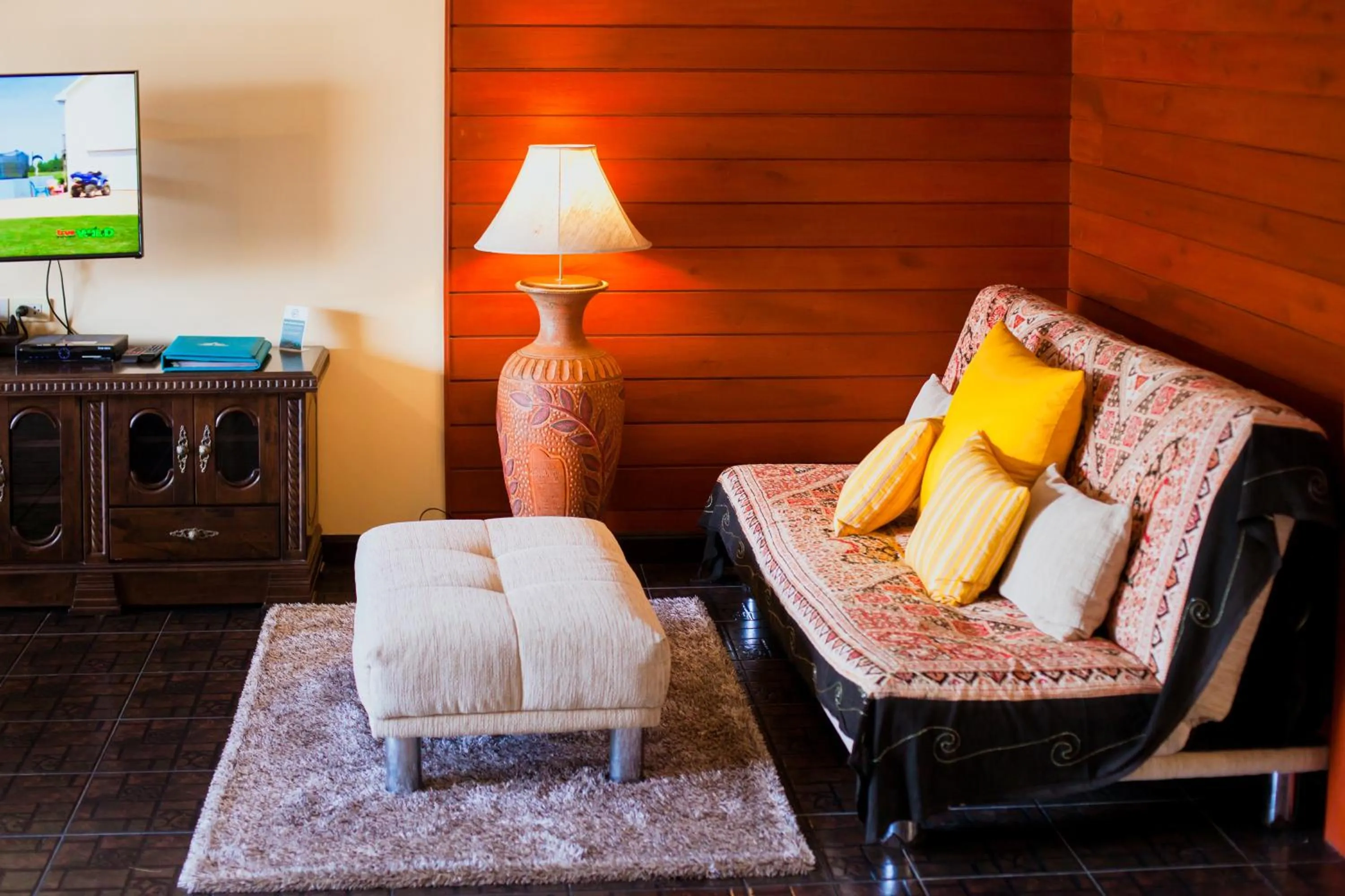 Living room in Baan Manuchang Villa, SHA Certified