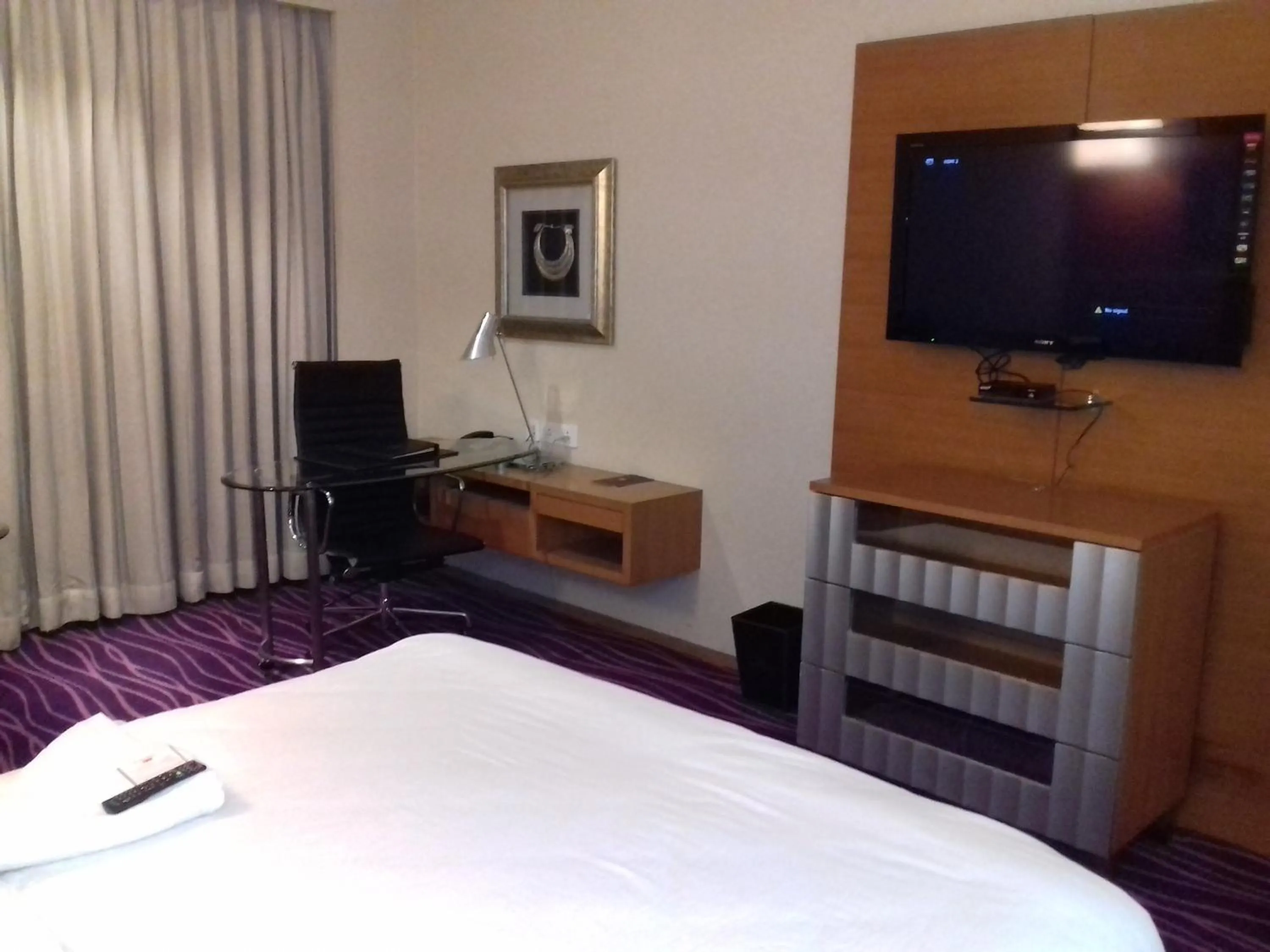 Bedroom in Orange Megastructure LLP