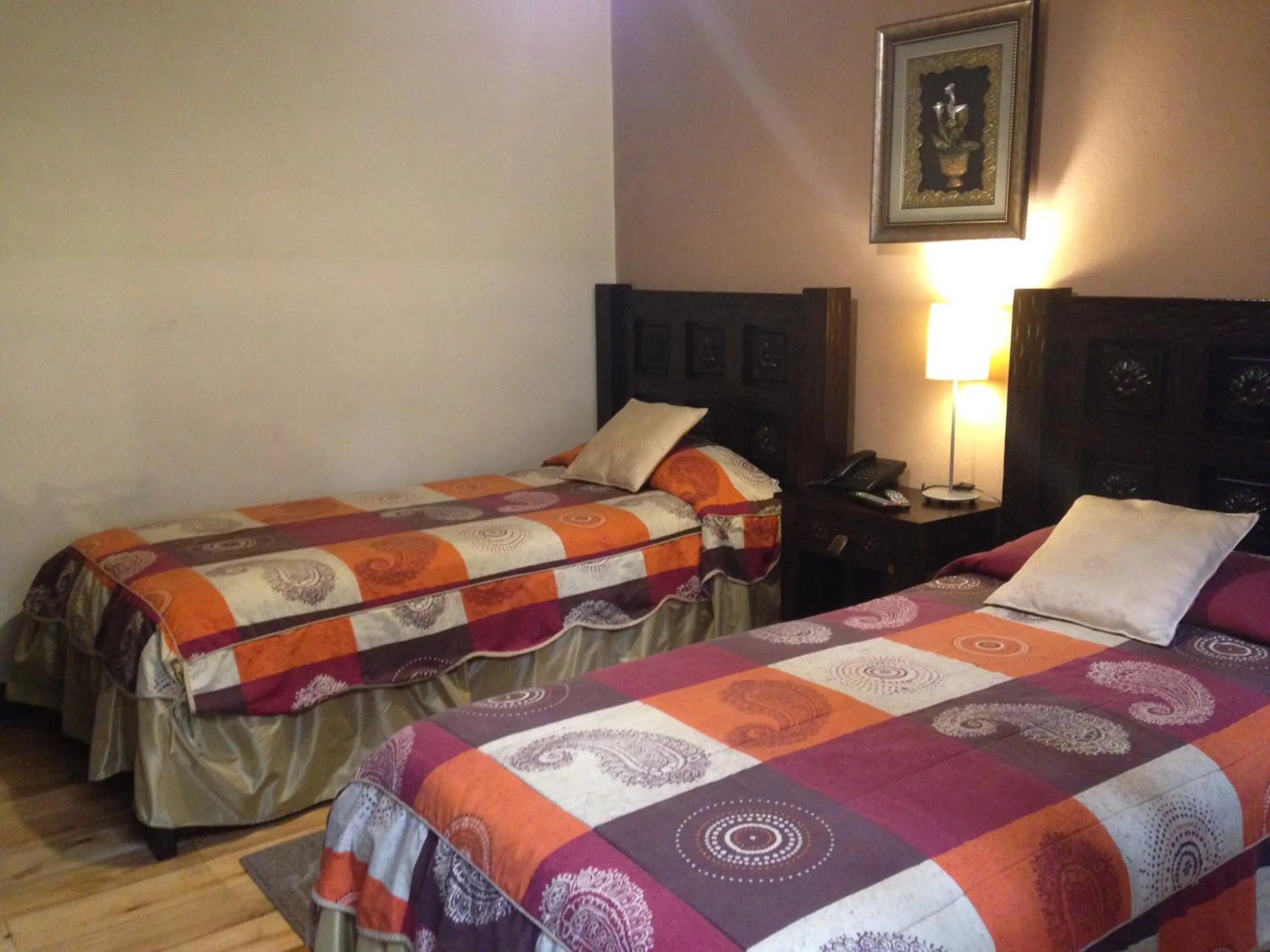 Photo of the whole room, Bed in La Posada Cuencana Hotel