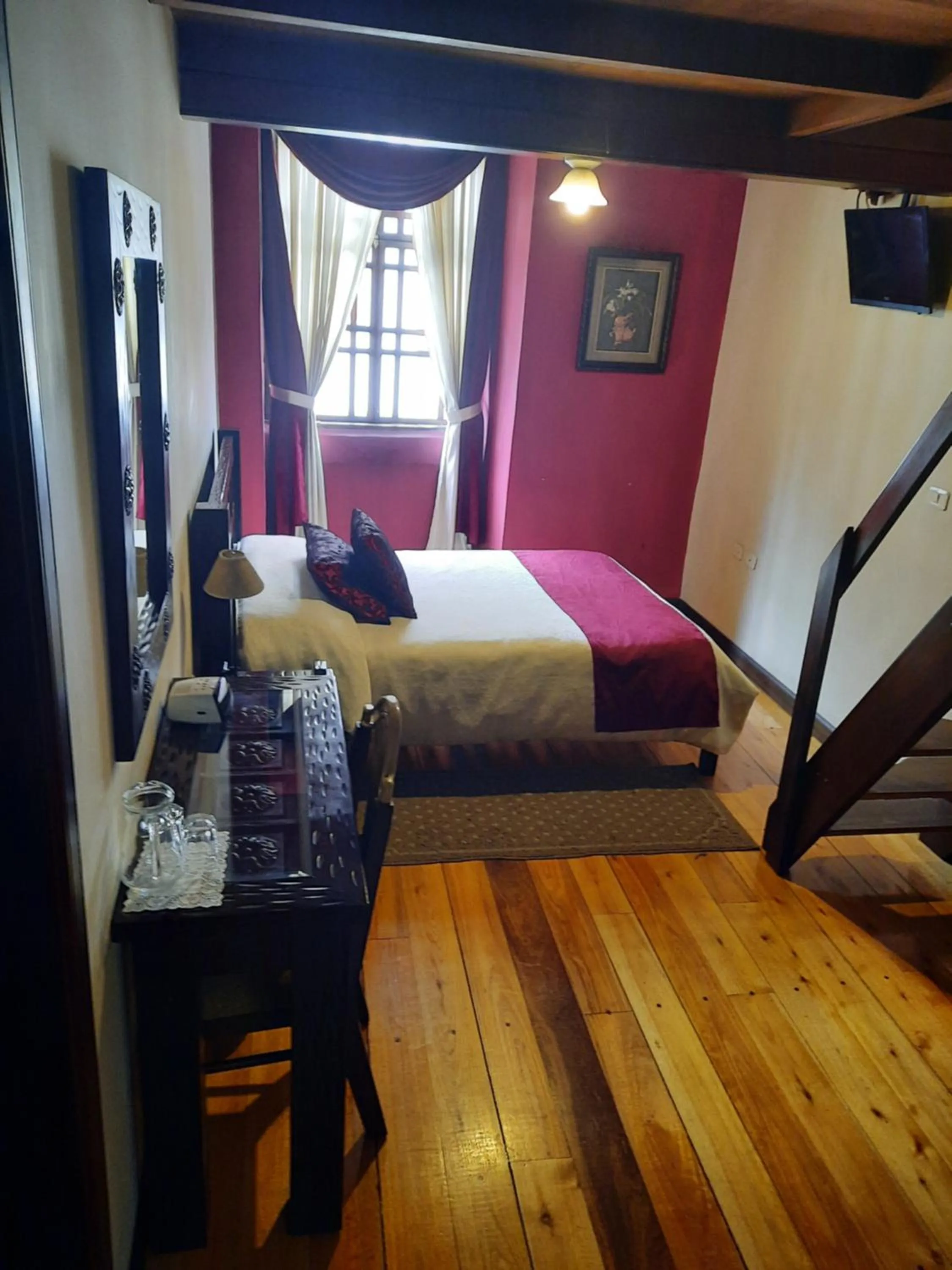 Photo of the whole room, Bed in La Posada Cuencana Hotel